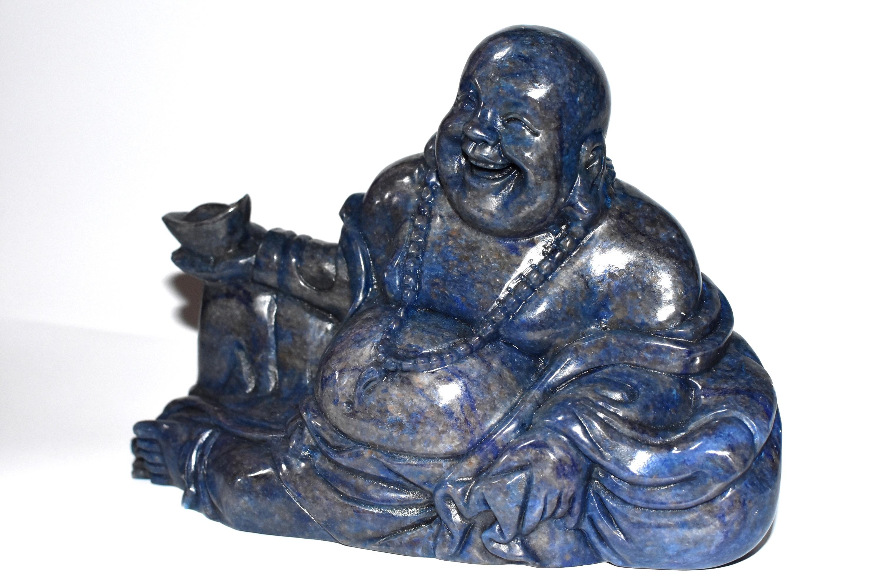 A large sculpture featuring the Chinese wealth Buddha. Weighing at an amazing 6.6 lb, the stone is gray blue with striking glittery gold. Finely carved facial features and realistic laughing expression. A great, substantial piece to boost energy and