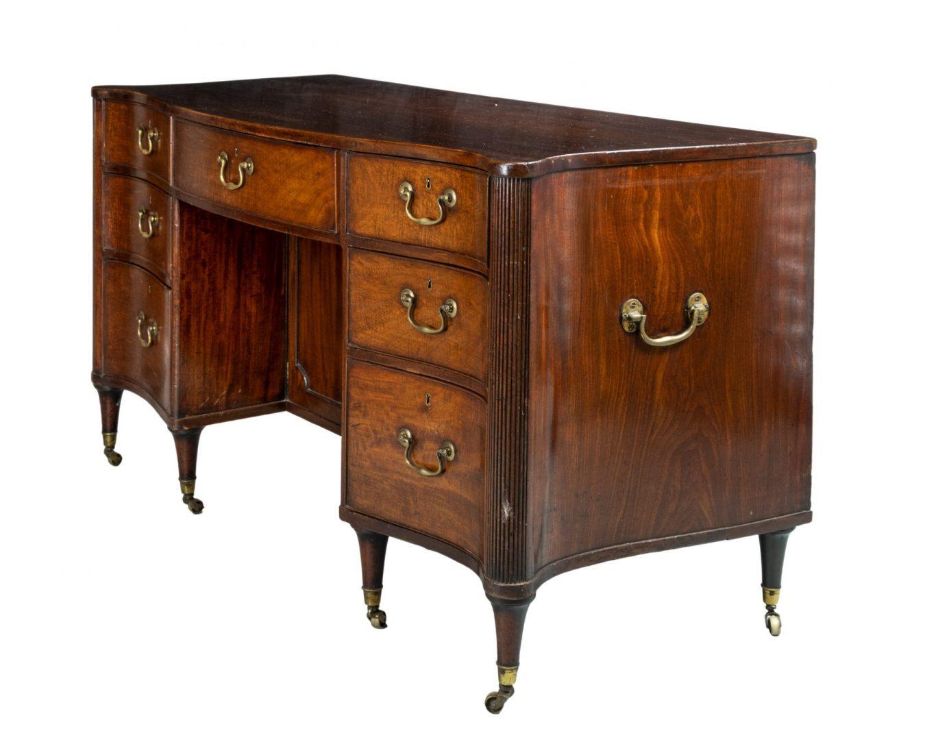 British Large Late 18th Century Hepplewhite Figured Mahogany Serpentine Kneehole Desk