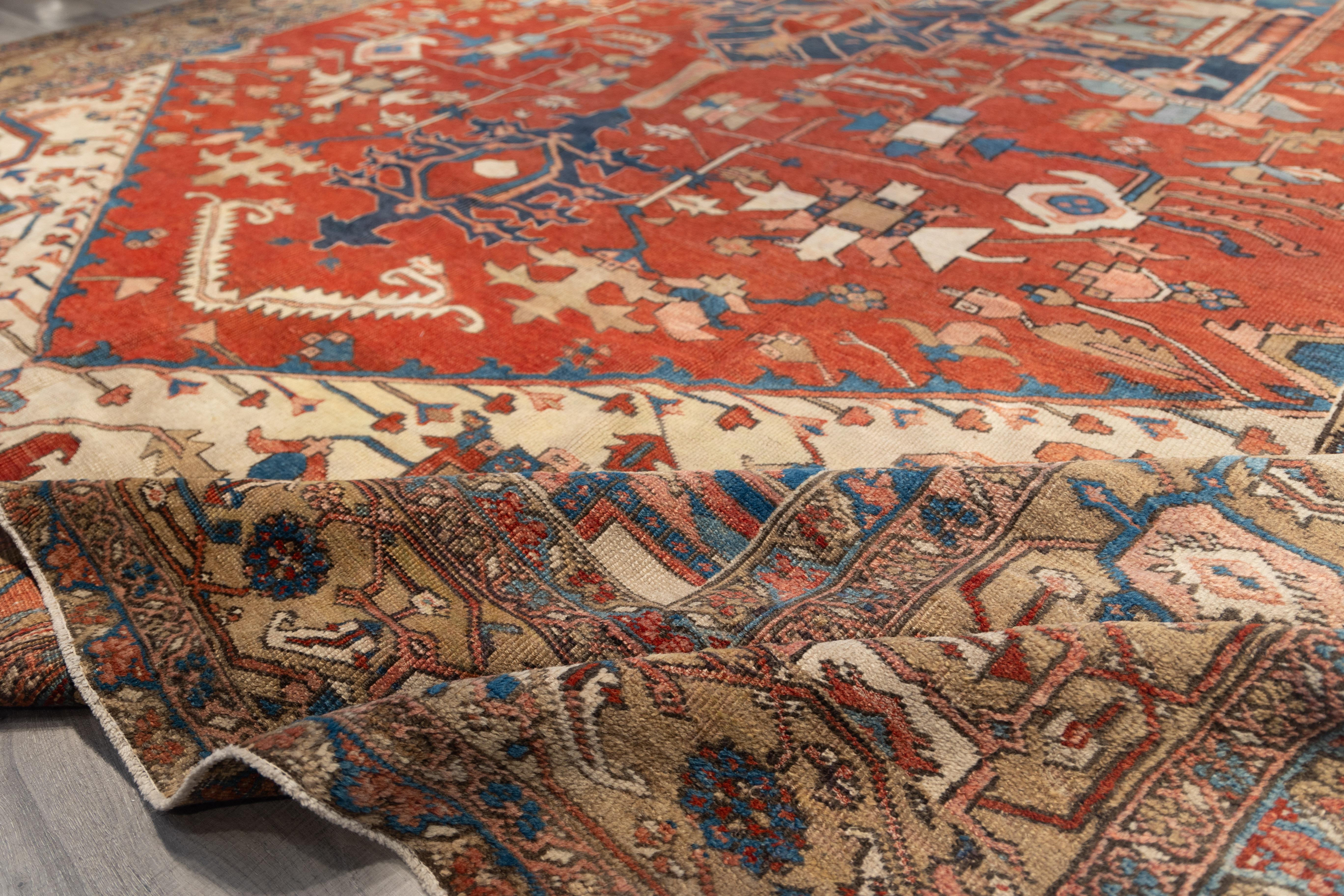 Persian Large late 19th century central medallion serapi  rug For Sale