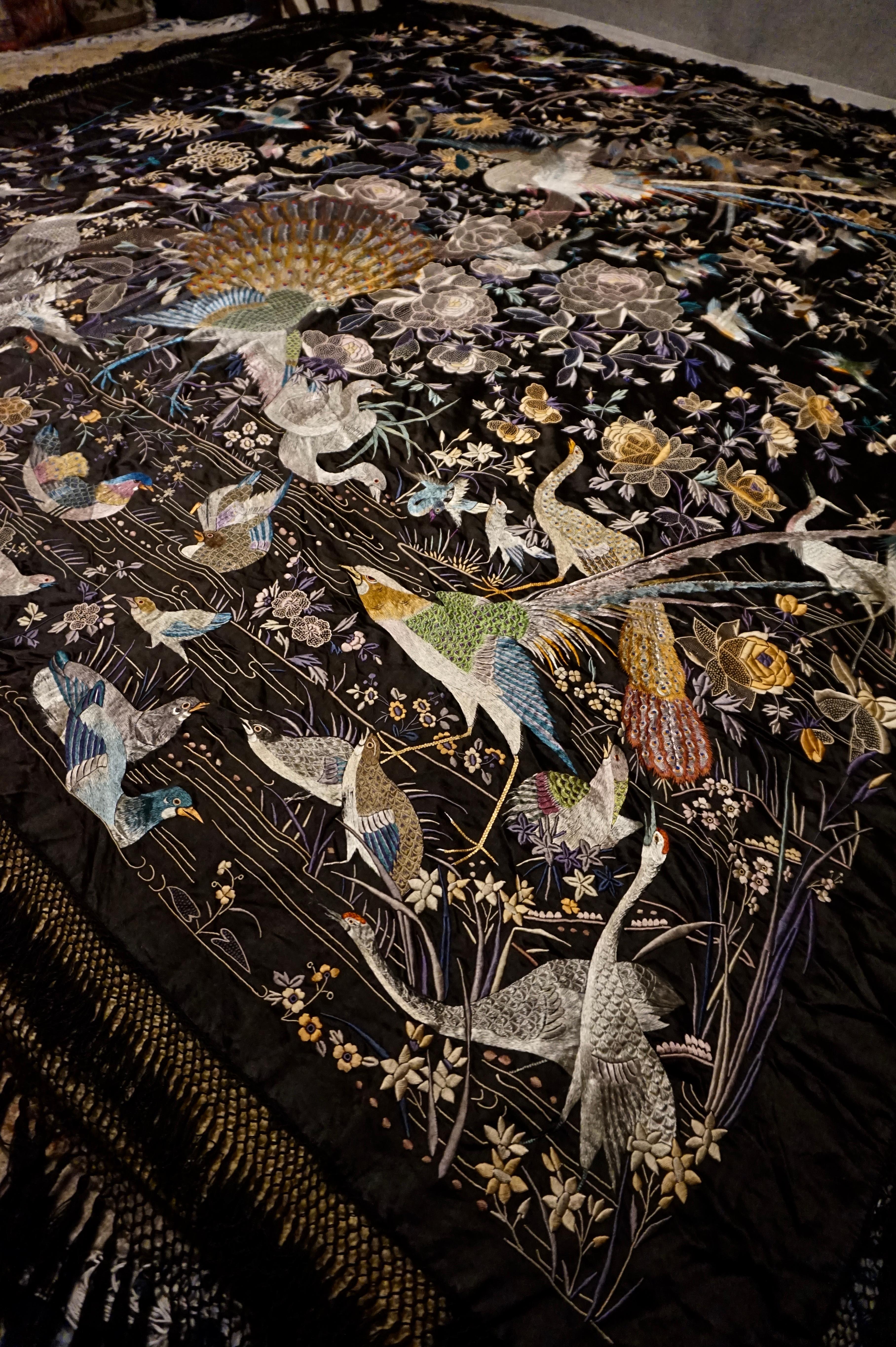 Rare superfine antique silk Chinese embroidery in a large size depicting multiple birds against a contrasting night sky. Exquisite rendition in a myriad vivid hues not to be seen again. Excellent condition,

circa 1890s.