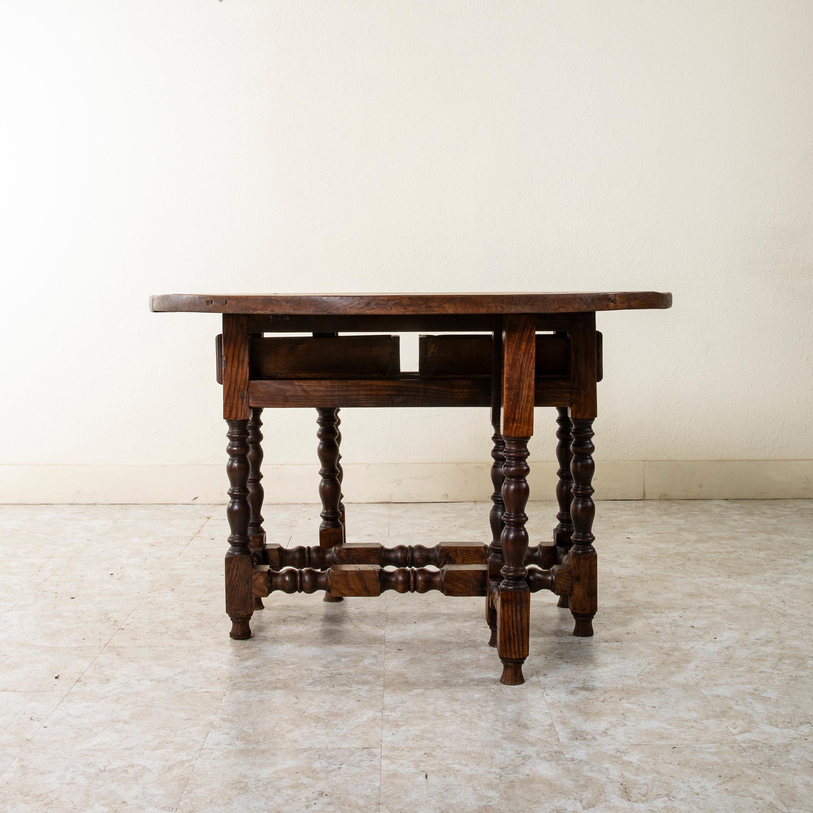 Large Late 19th Century French Oak Gateleg Table, Two Drawers, Hand Forged Iron In Good Condition In Fayetteville, AR