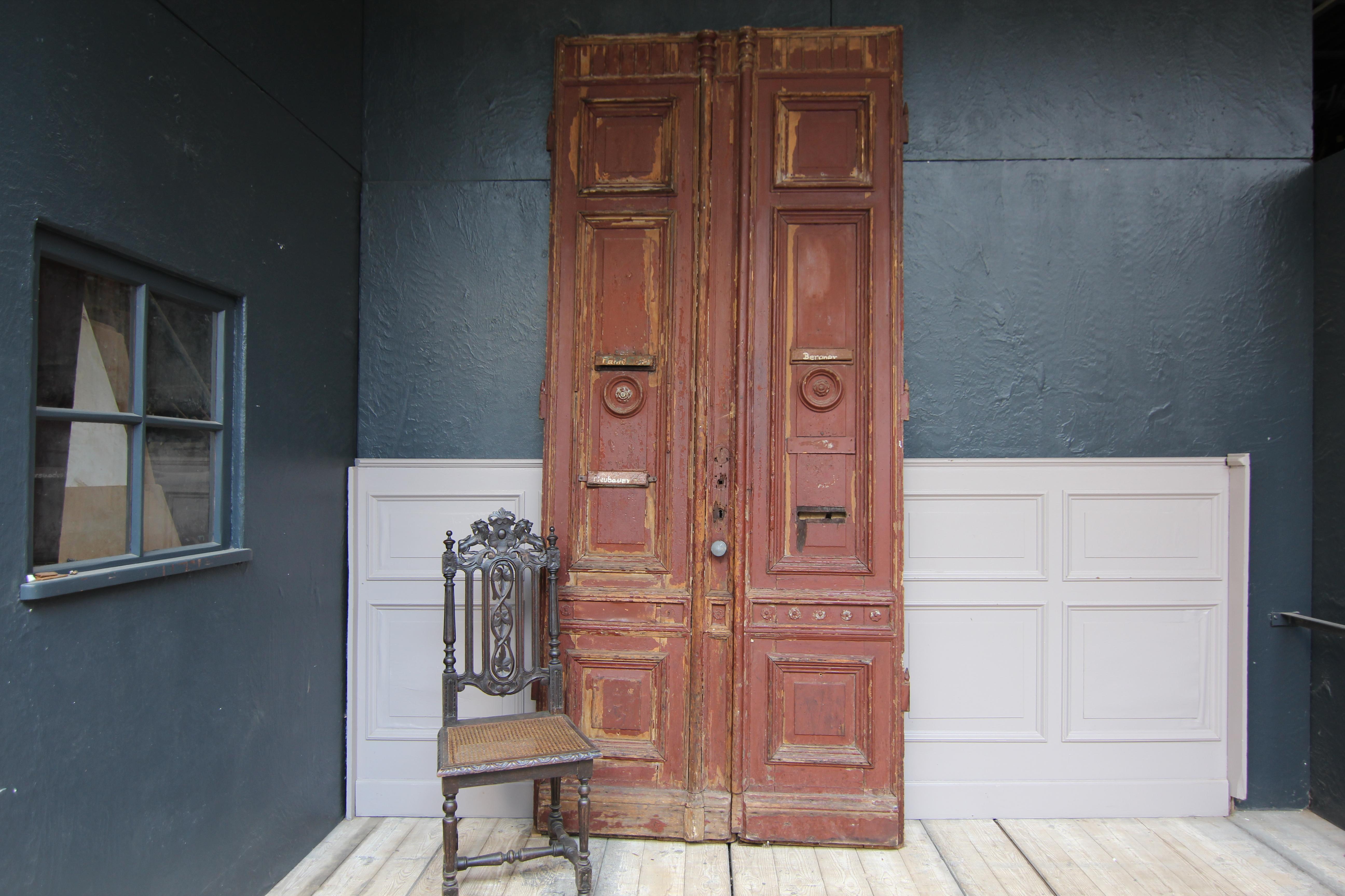 Large German double door in the original color with a beautiful patina from the late 19th century.

Very decorative unique piece in unrestored condition. 

Dimensions: 
285 cm high / 112.2 inch high,
126 cm (together) wide / 49.61 inch
