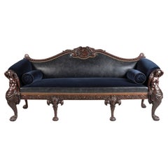 Grand canapé de la fin du 19e siècle en acajou sculpté à la main avec tissu en cuir et en velours