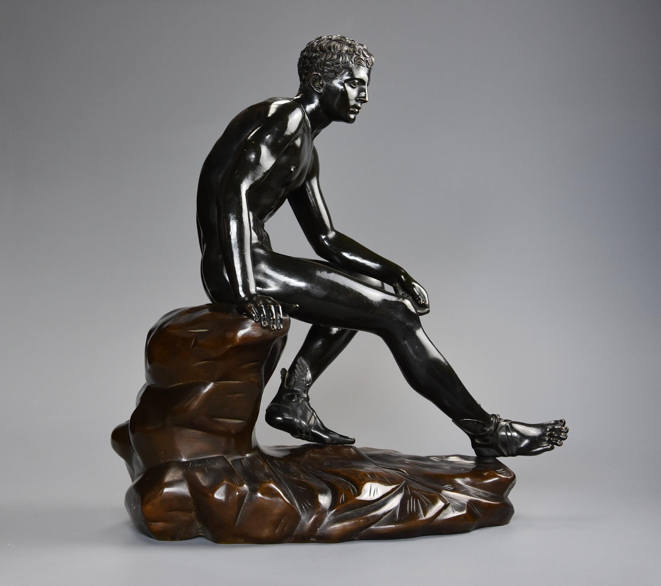 A large late 19th century Grand Tour Italian bronze of 'Seated Hermes', after the Antique, with foundry mark 'Fonderia Artistica, Sabatino Angelis & Fils, NAPOLI', of good patination.

This figure of Hermes (or also known as Mercury) is seated on