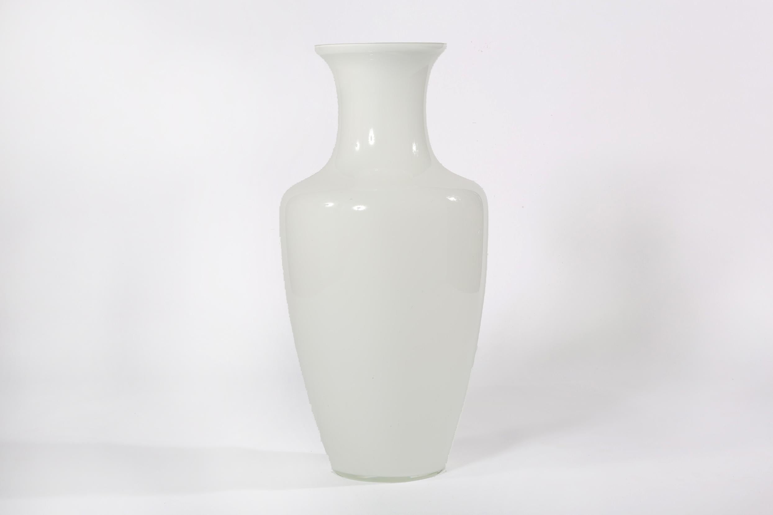 Very large late 20th century art glass white color floor vase or umbrella stand. The vase or umbrella stand is in good condition. Maker's mark  . Minor wear consistent with age / use. The piece stand about 30 inches tall x 15 inches diameter.