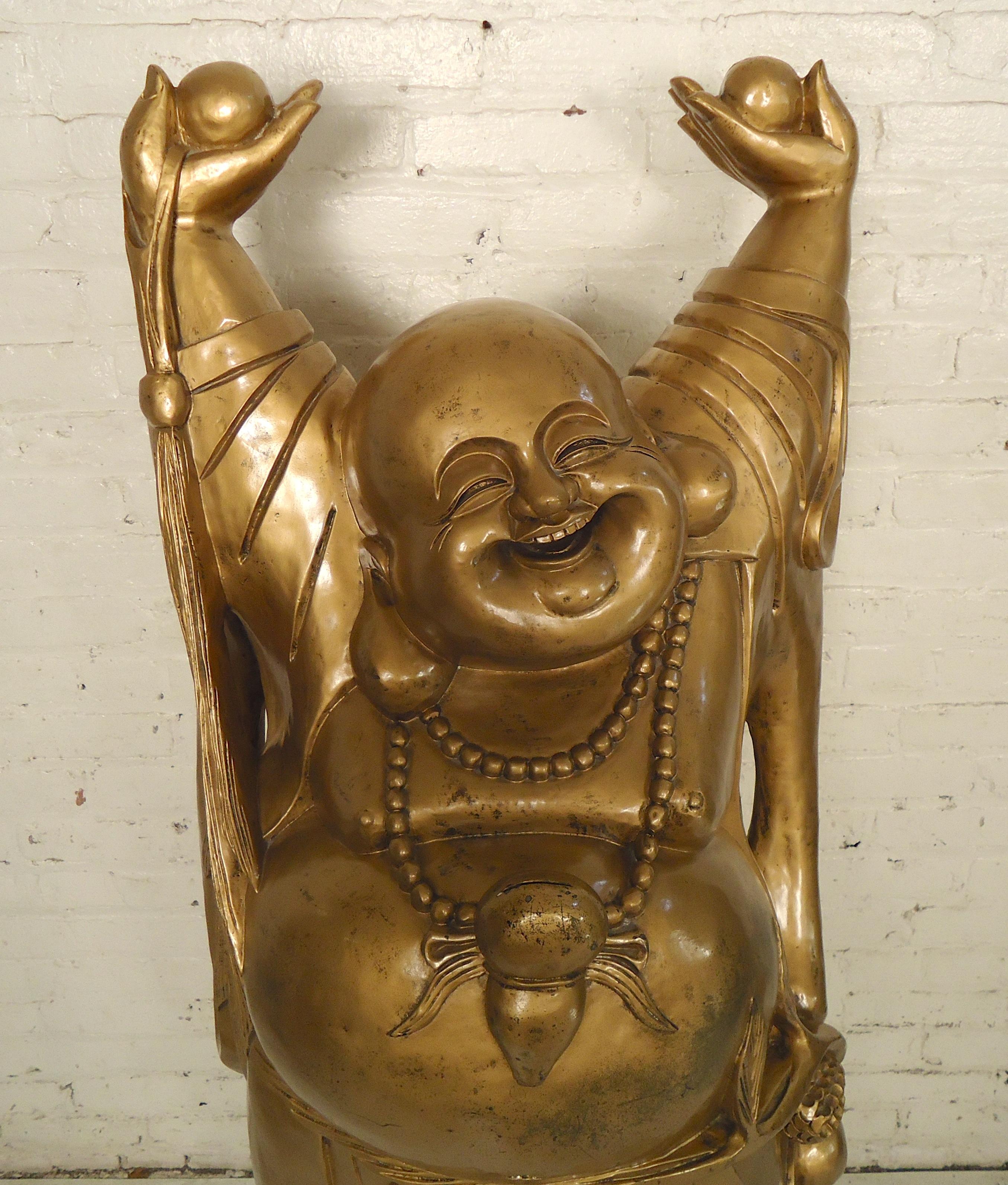 big laughing buddha statue