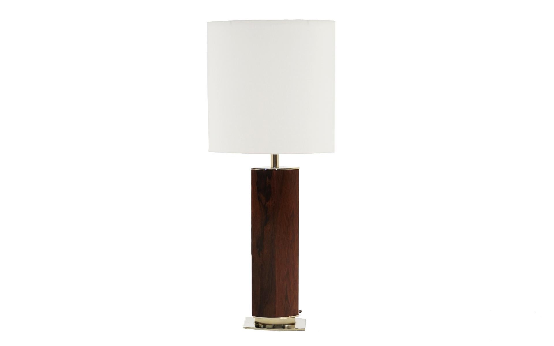 Beautiful, striking Laurel table lamp in Brazilian rosewood and solid brass, not brass plate. The new custom shade is an elliptical shape with flat ends. Signed with Laurel label on the light socket.