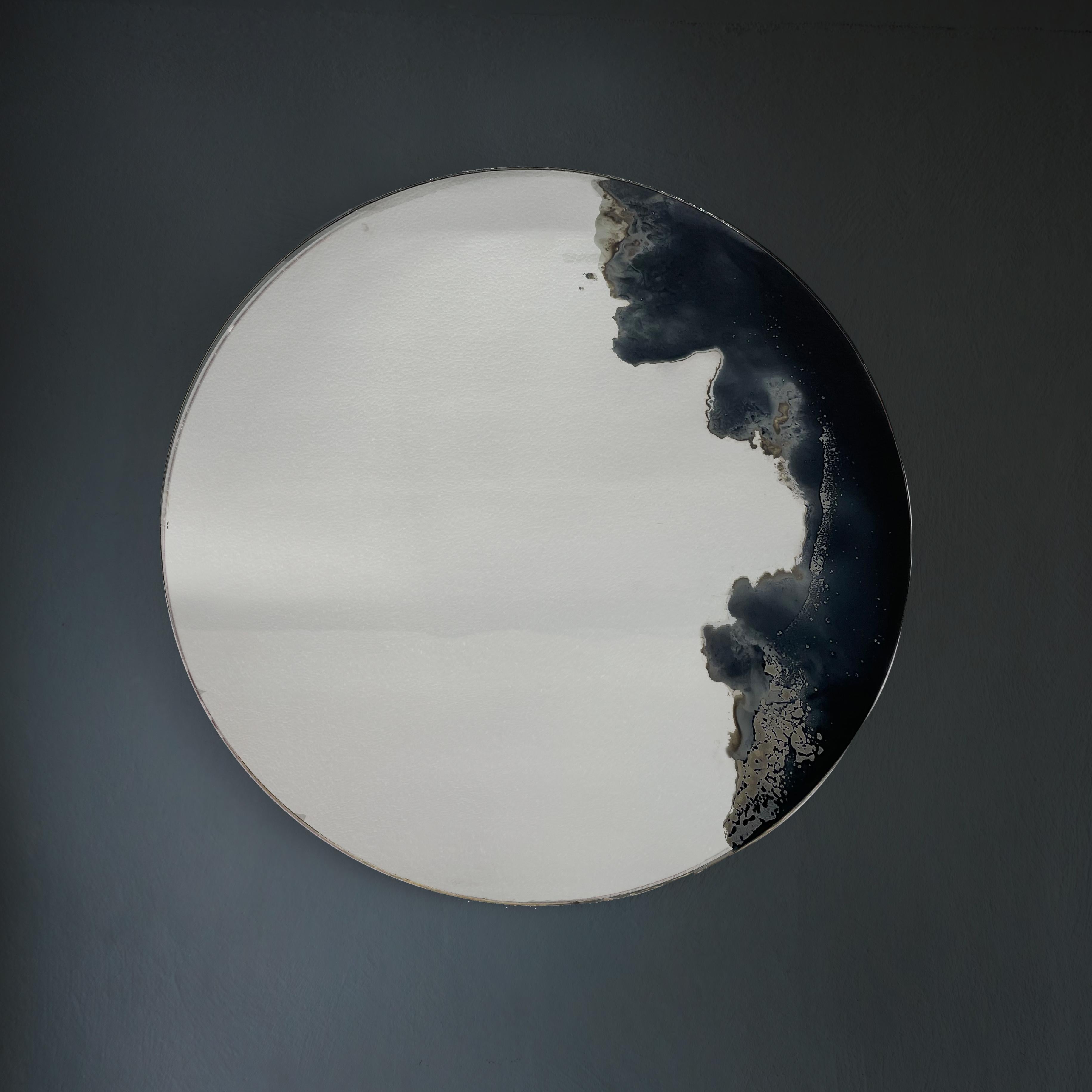 Large lava mirror by Slow Design 
Dimensions: diameter 120 cm 
Materials: Glass. Black decor. 
Technique: Grisaille.
Available in sizes medium and small.


Lava mirror, made from a subtle work on pigments, with random and unique