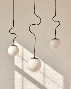 Large Lawrence Modern Globe Pendant in Oil Rubbed Brass