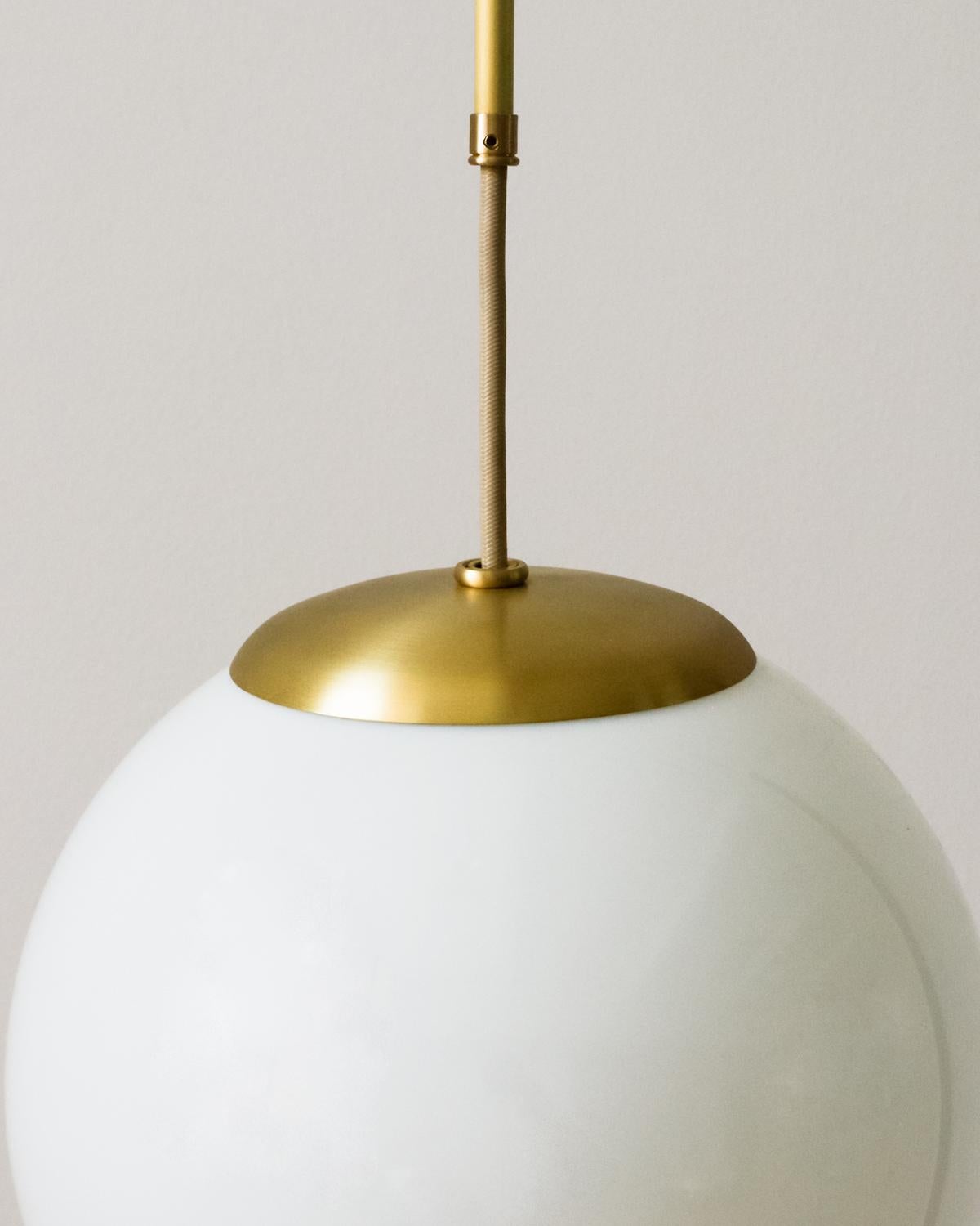American Satin Brass Modern Lawrence Globe Pendant, Large For Sale