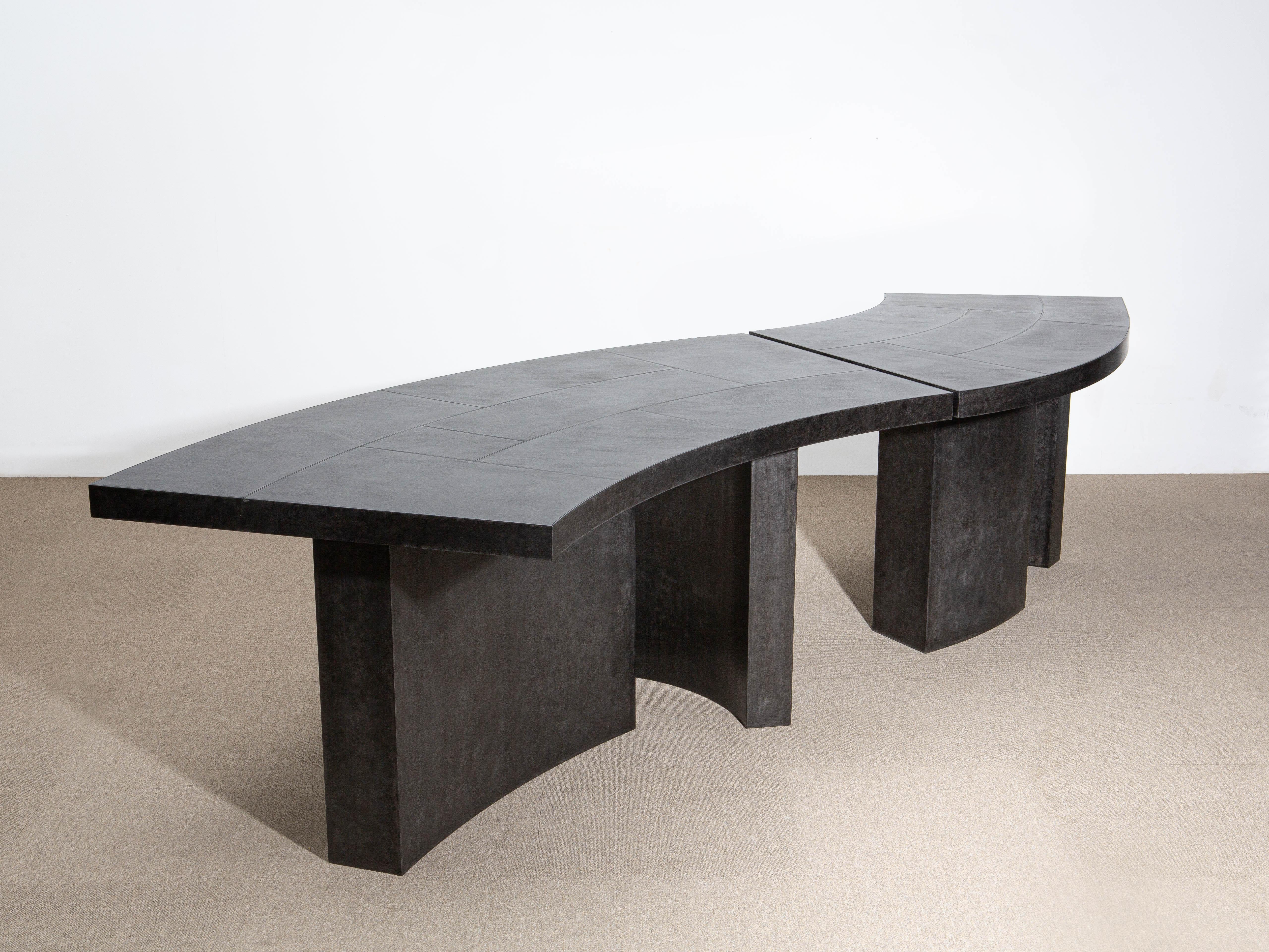 Large layered parkerized steel desk by Hyungshin Hwang
Dimensions: D 310 x W 100 x H 75 cm
Materials: parkerized steel

Layered Series is the main theme and concept of work of Hwang, who continues his experiment which is based on architectural