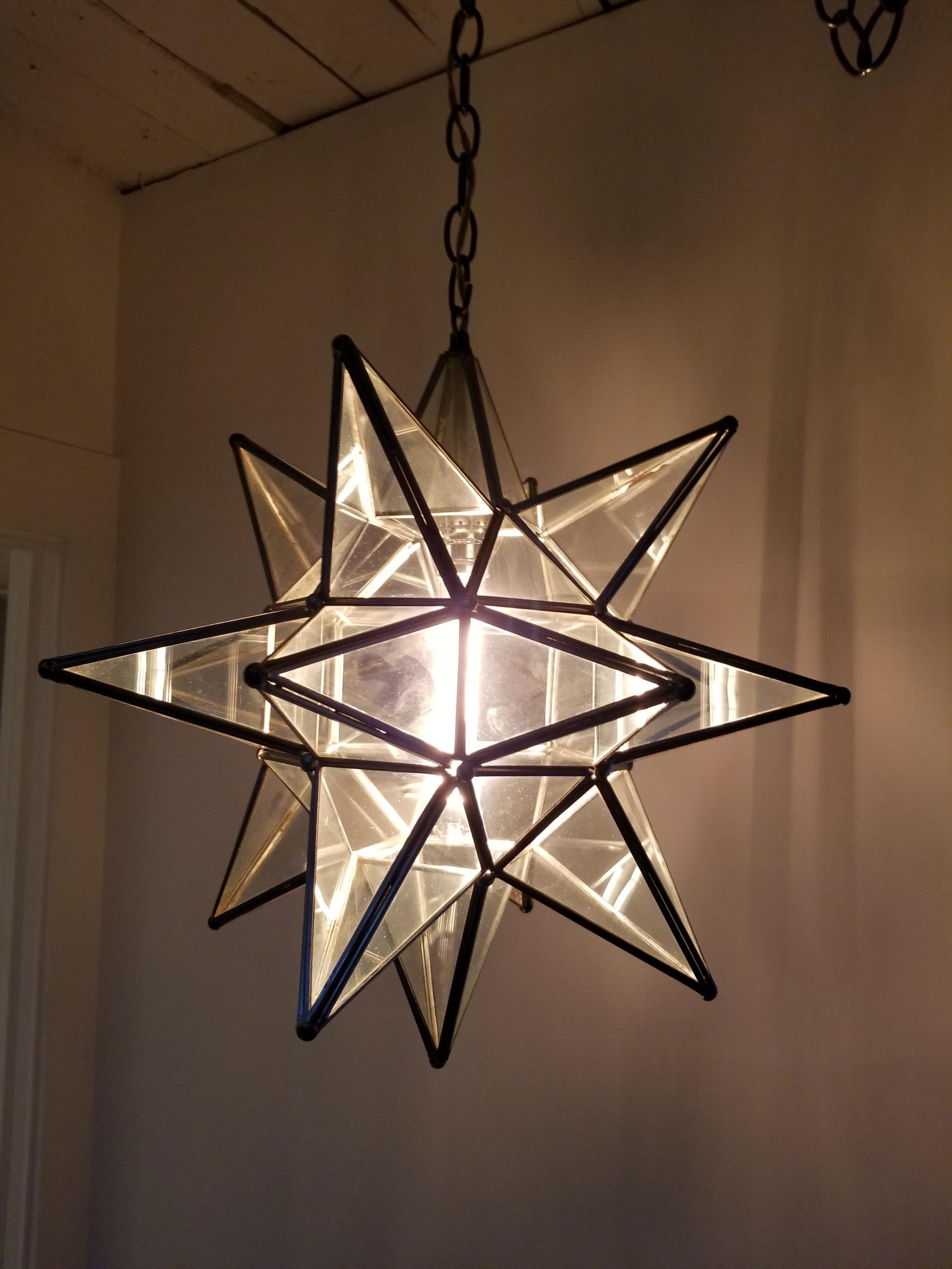 A very beautiful, handmade and electrified, leaded clear glass Moravian star lighting fixture.