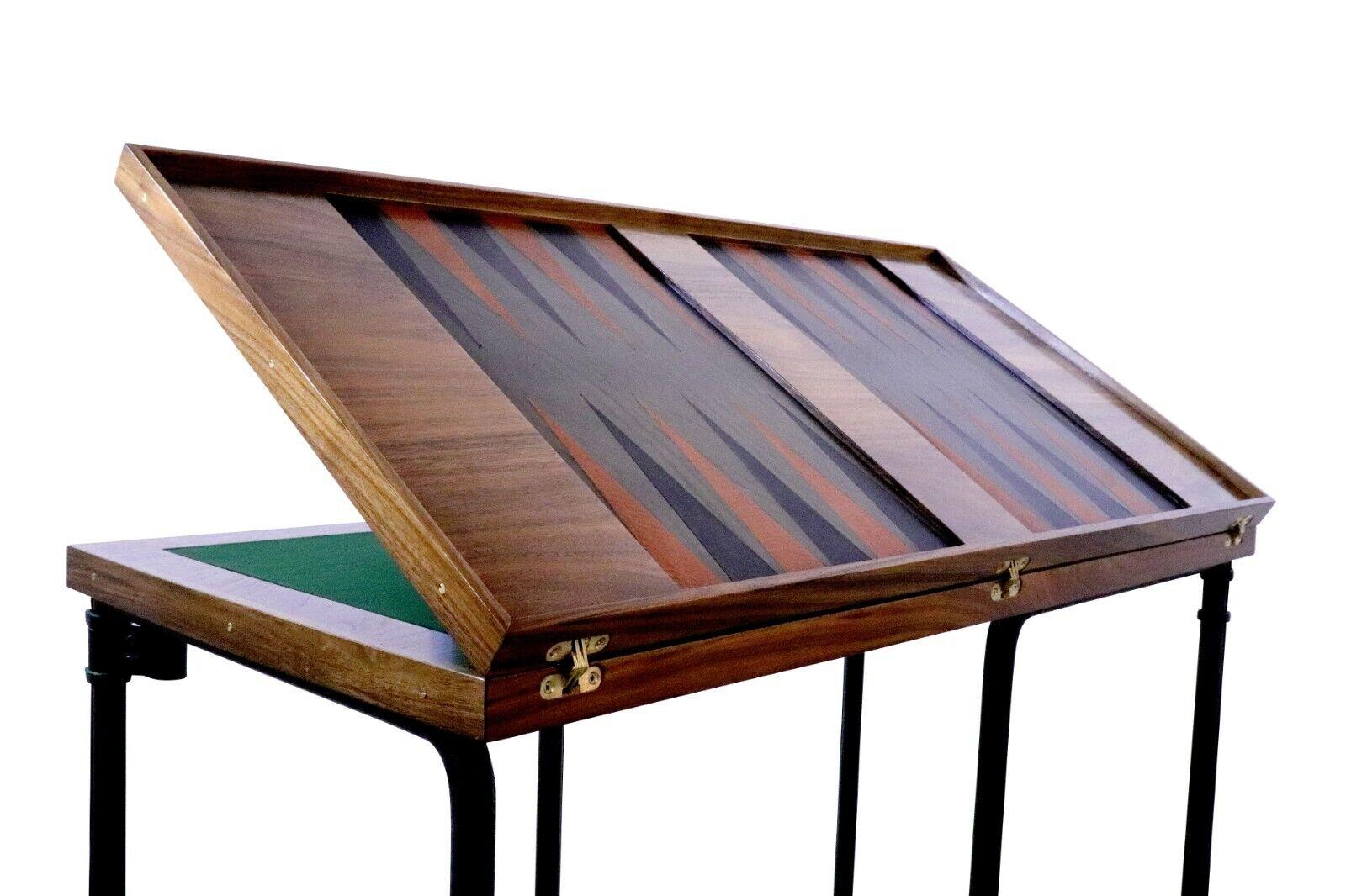 Made to order, these Games tables are of extremely high quality: bespoke made in England, the beautiful walnut and leather finish makes for a sophisticated games experience. The metamorphic folding hinge allows for diverse play (backgammon, drafts,