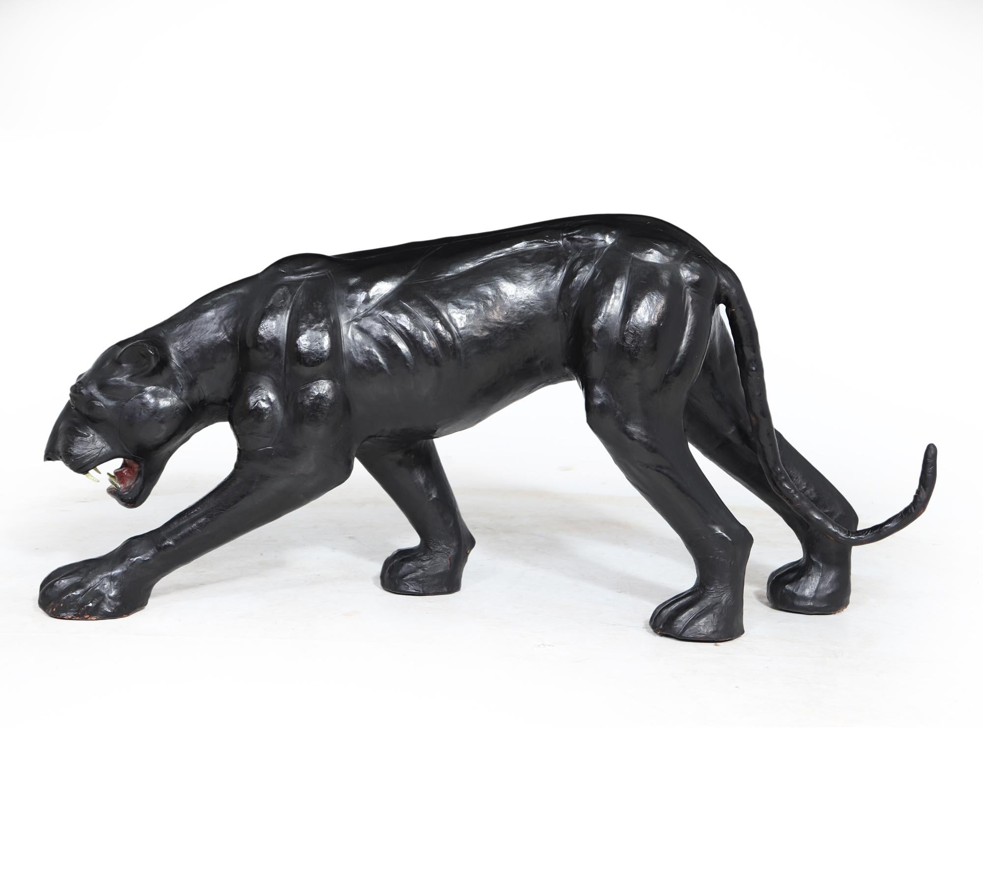 A very rare high quality and very well sculpted leather clad, wire and papier mache exceptional fave and definition, the panther has perfect proportion standing in a stalking pose. This was produced in the 1950 unsure of where and by whom but the
