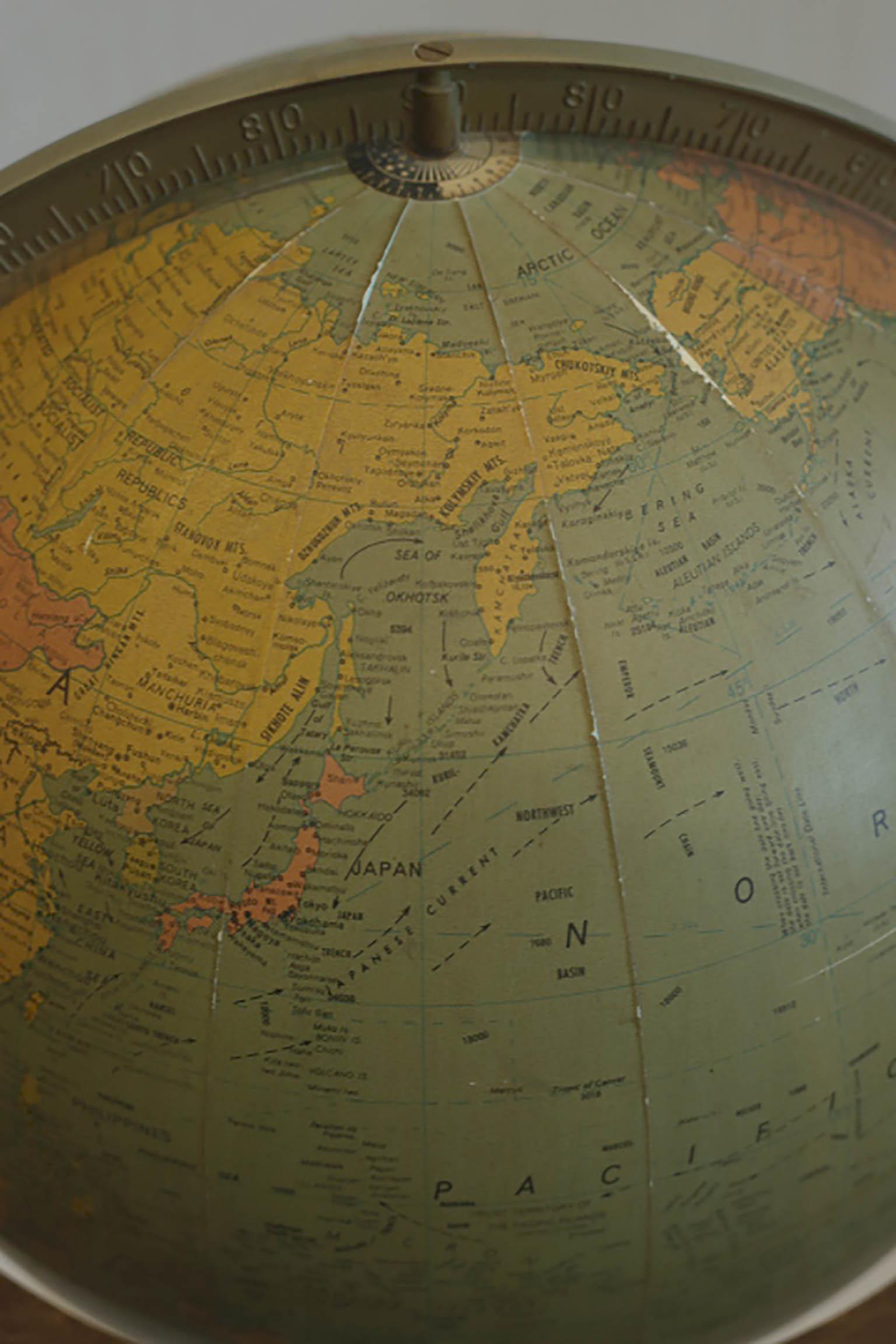 globe with wooden stand