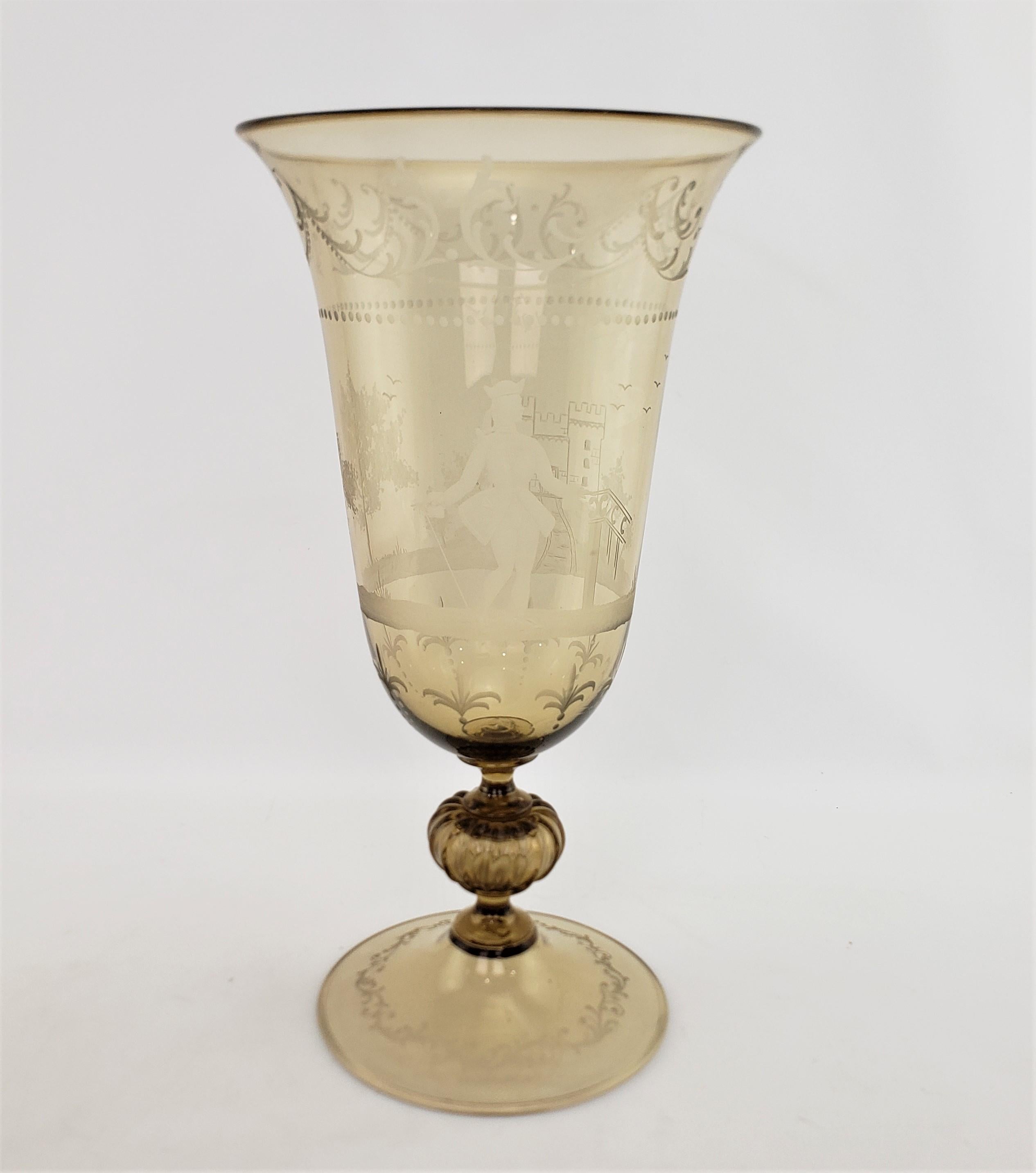 This very large and substantial light amber art glass vase is unsigned, but presumed to originate from Italy and dating to approximately 1950 and done in a Renaissance Revival style. This vase is hand-crafted and done in a light amber glass with cut