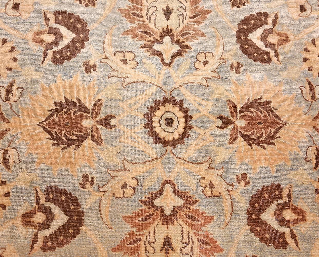 Beautiful Light Blue Background Large Size Antique Persian Khorassan Rug, Country of Origin / Rug Type: Persian Rug, Circa Date: Early 20th Century. Size: 11 ft 9 in x 15 ft (3.58 m x 4.57 m)

Like so many of the beautiful antique Persian