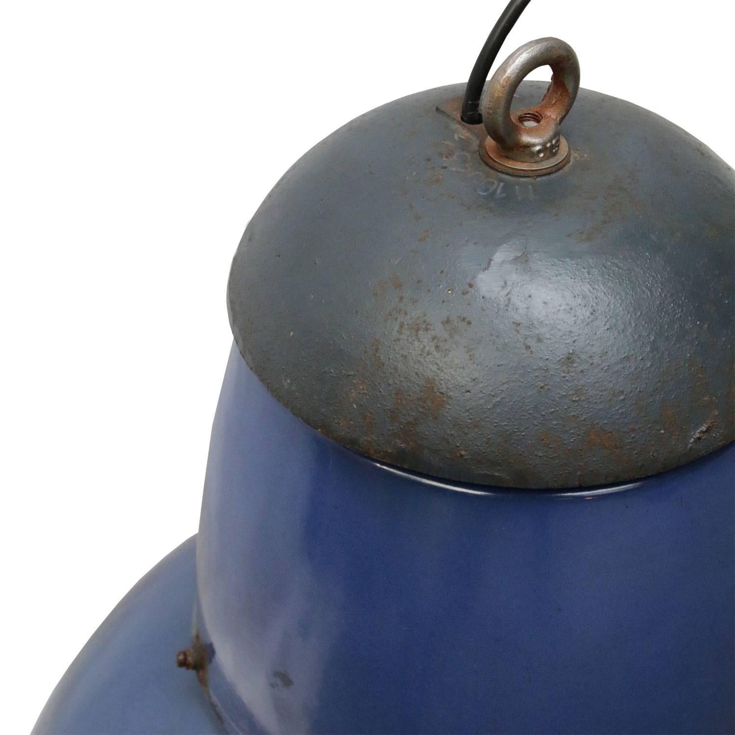 Blue enamel industrial pendant.
Cast iron top. White interior.

Weight: 7.5 kg / 16.5 lb

All lamps have been made suitable by international standards for incandescent light bulbs, energy-efficient and LED bulbs. E26/E27 bulb holders and new wiring
