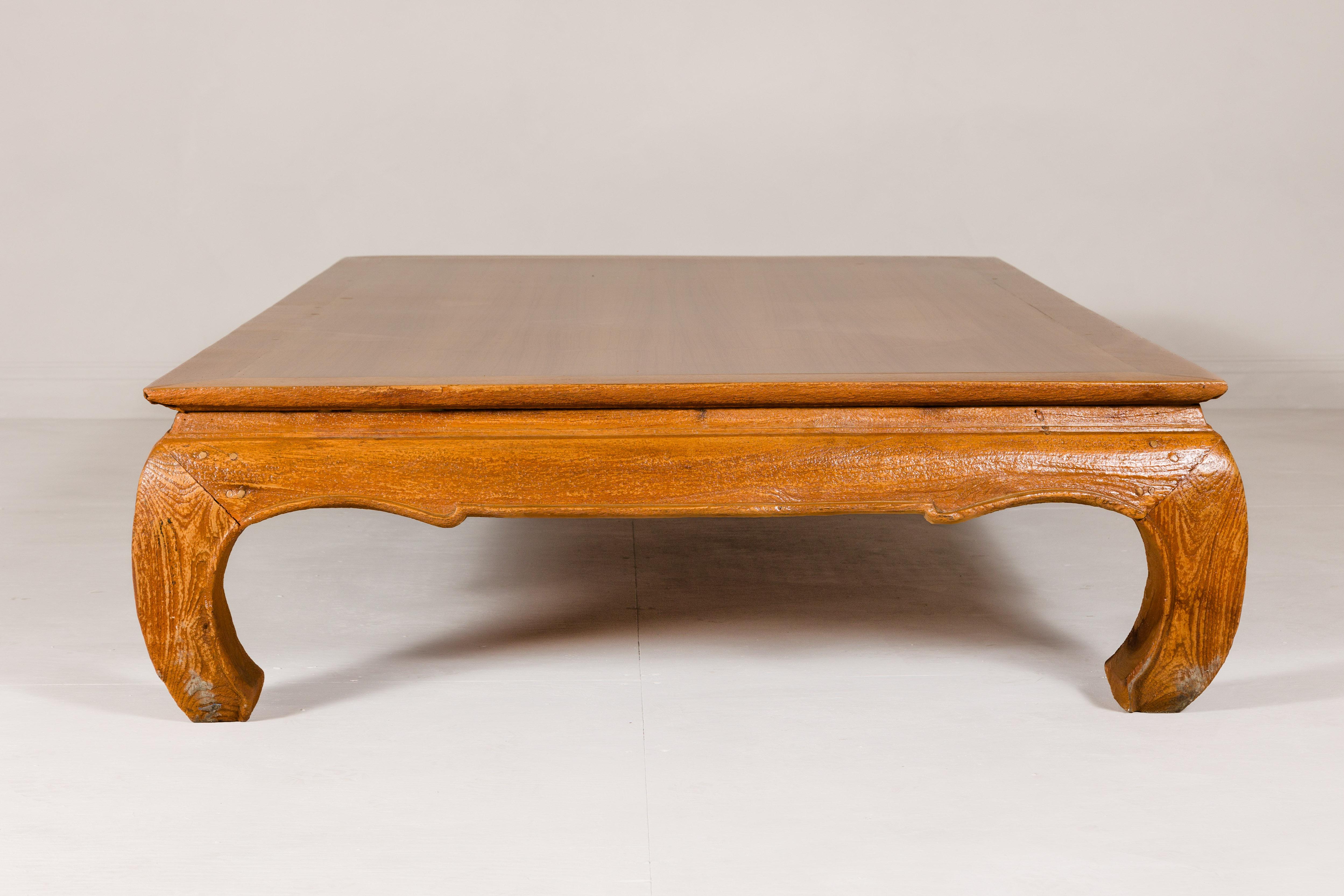 Thai Large Light Brown Teak Vintage Coffee Table with Carved Chow Legs For Sale