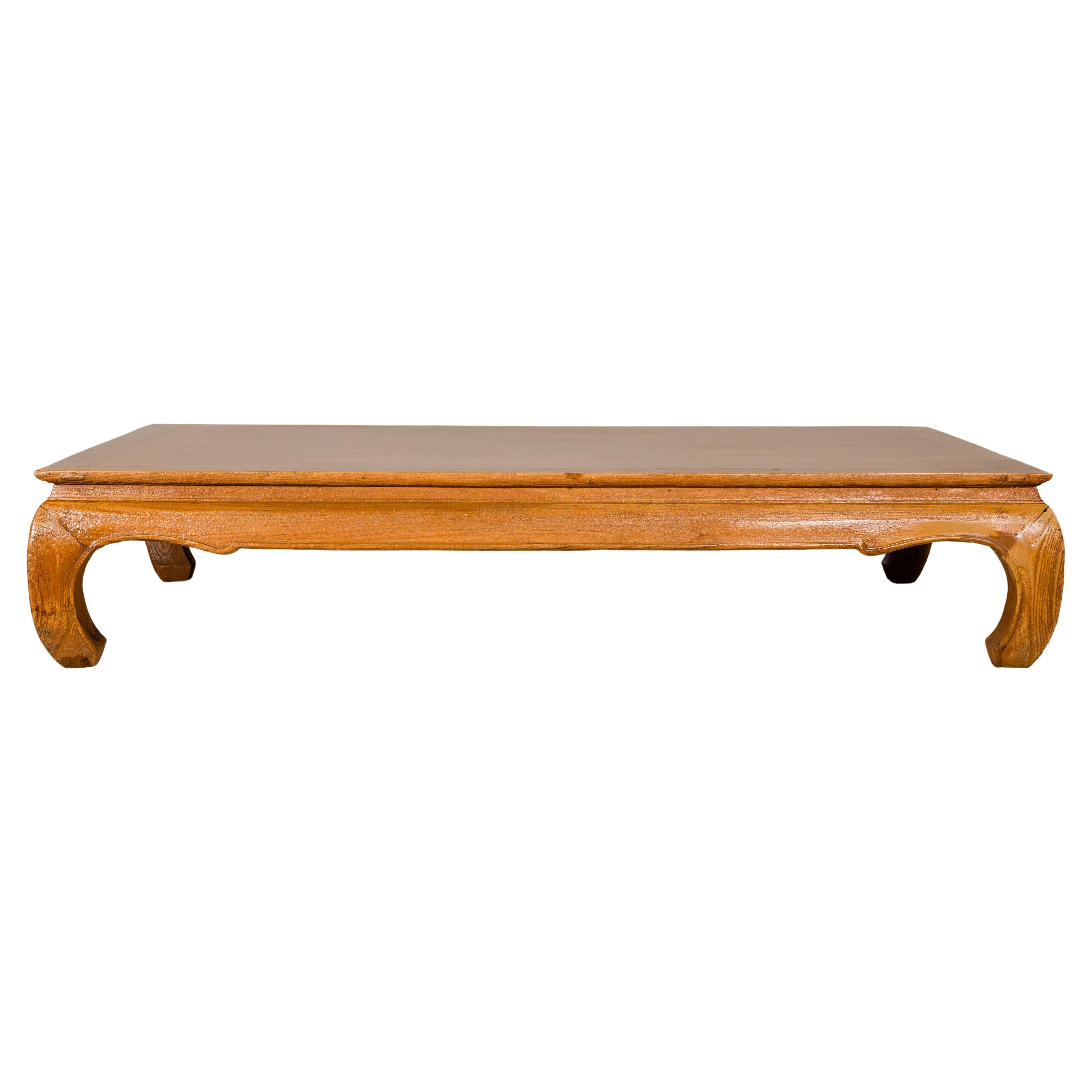 Large Light Brown Teak Vintage Coffee Table with Carved Chow Legs For Sale