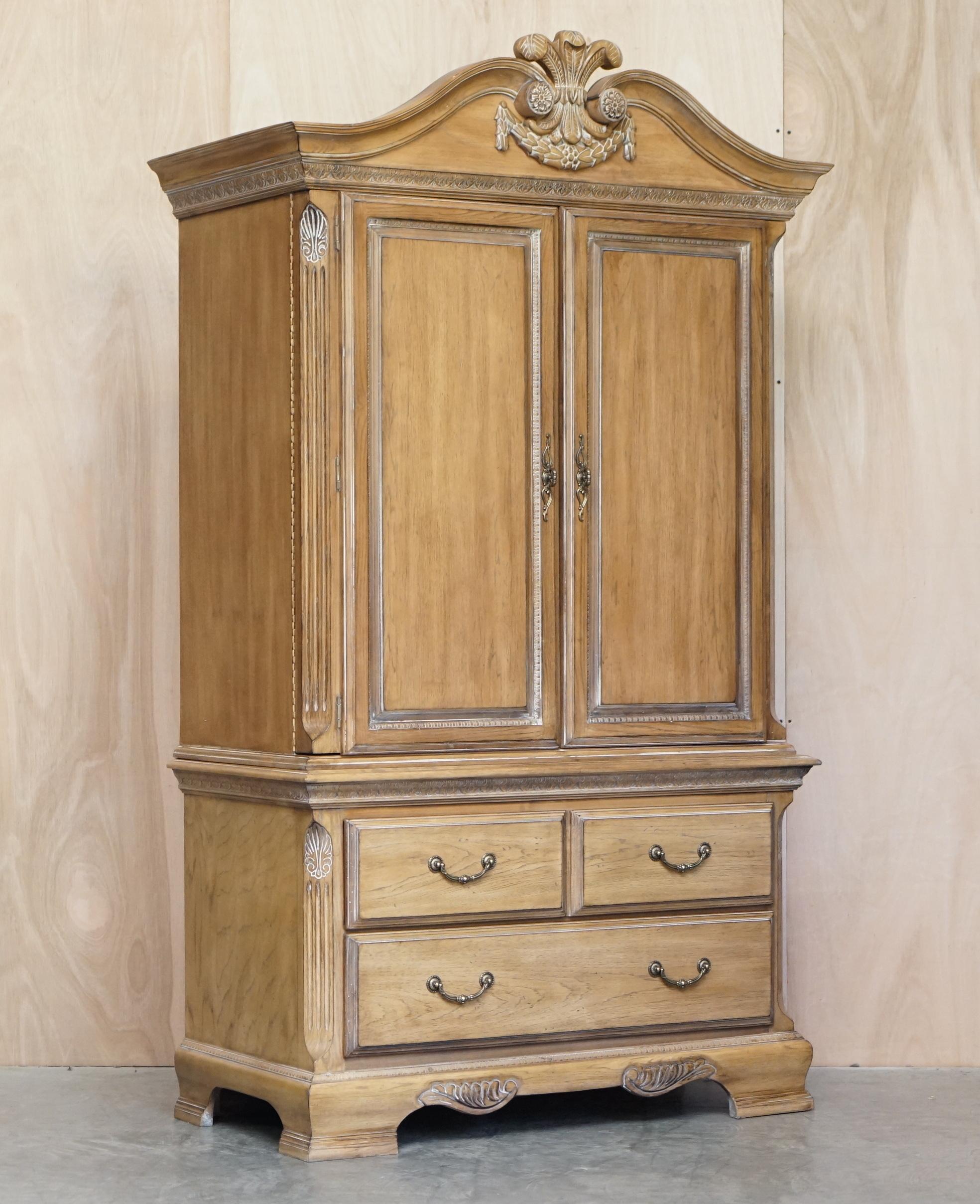 We are delighted to offer for sale this lovely large Limed Oak media cupboard with drawers and ornately carved Prince Charles, Flur De Lis feathers

A good looking well made and decorative piece, originally designed as a media unit so you put a TV