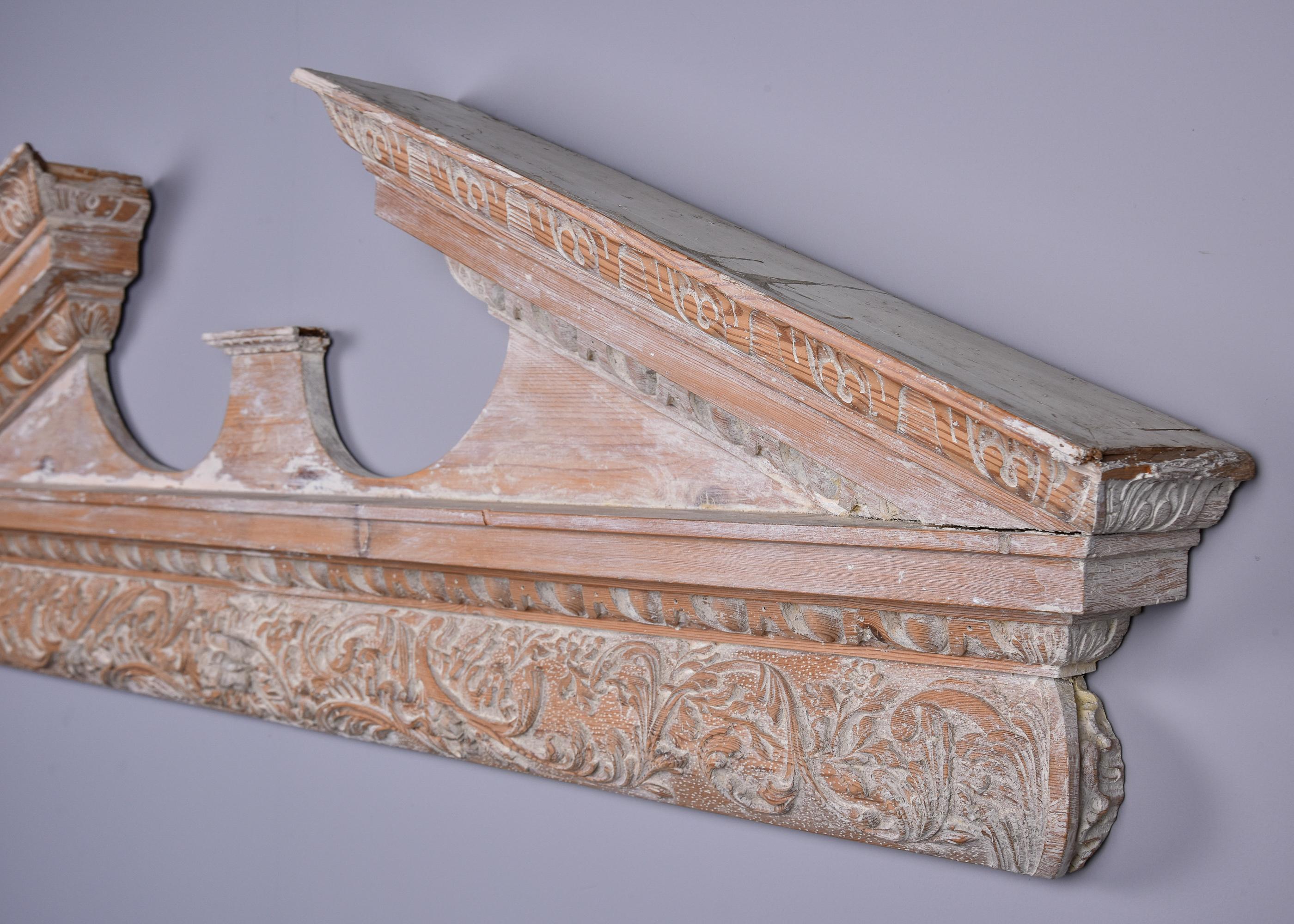English Large Limed Wooden Overdoor Split Pediment With Highly Carved Bottom Edge For Sale