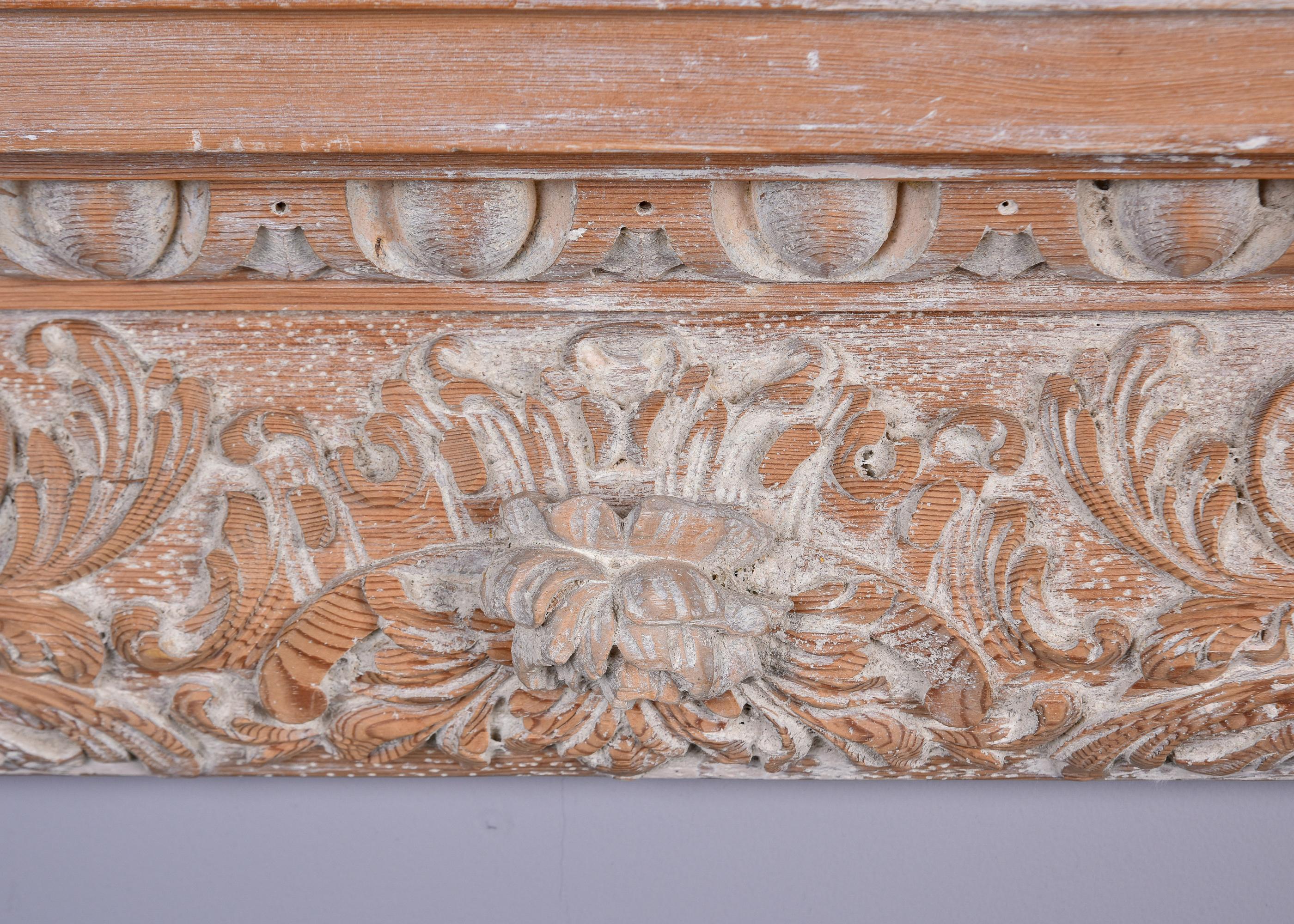 20th Century Large Limed Wooden Overdoor Split Pediment With Highly Carved Bottom Edge For Sale