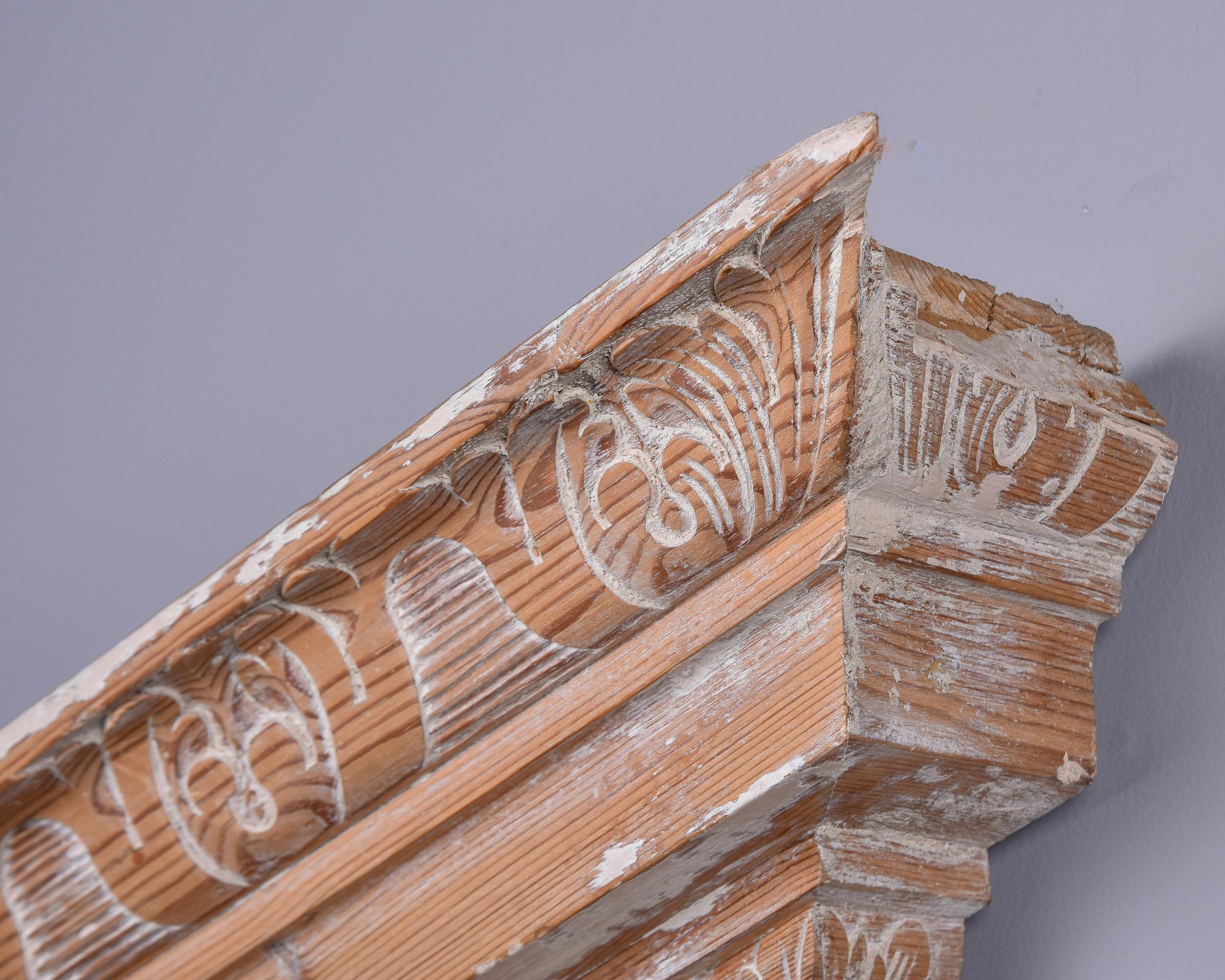 Pine Large Limed Wooden Overdoor Split Pediment With Highly Carved Bottom Edge For Sale
