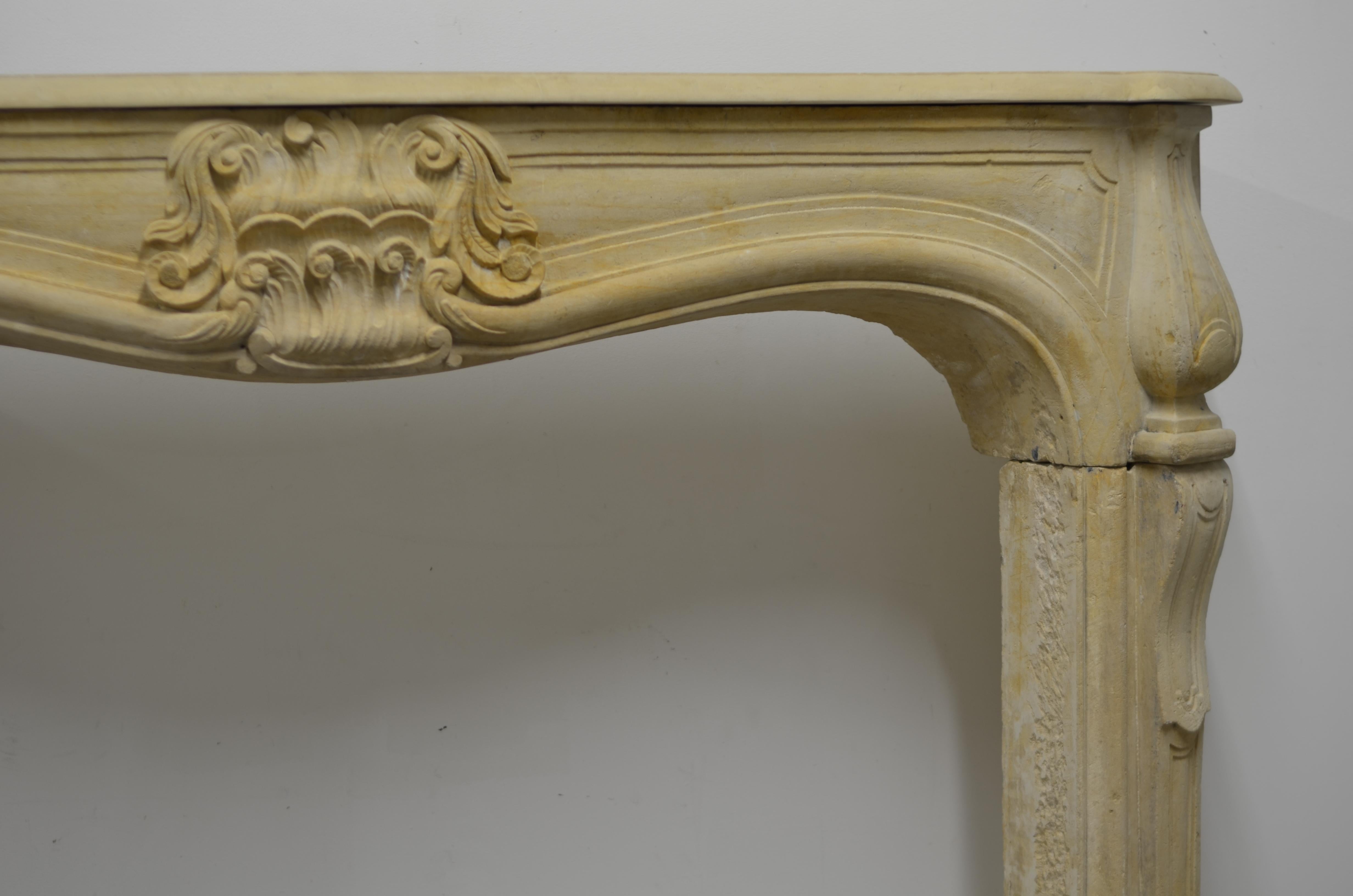 Large Limestone Louis XV Fireplace Mantel In Fair Condition In Haarlem, Noord-Holland