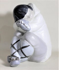 Large Lladro Yupik or Inuit Boy Crouched and Resting Figurine or Sculpture