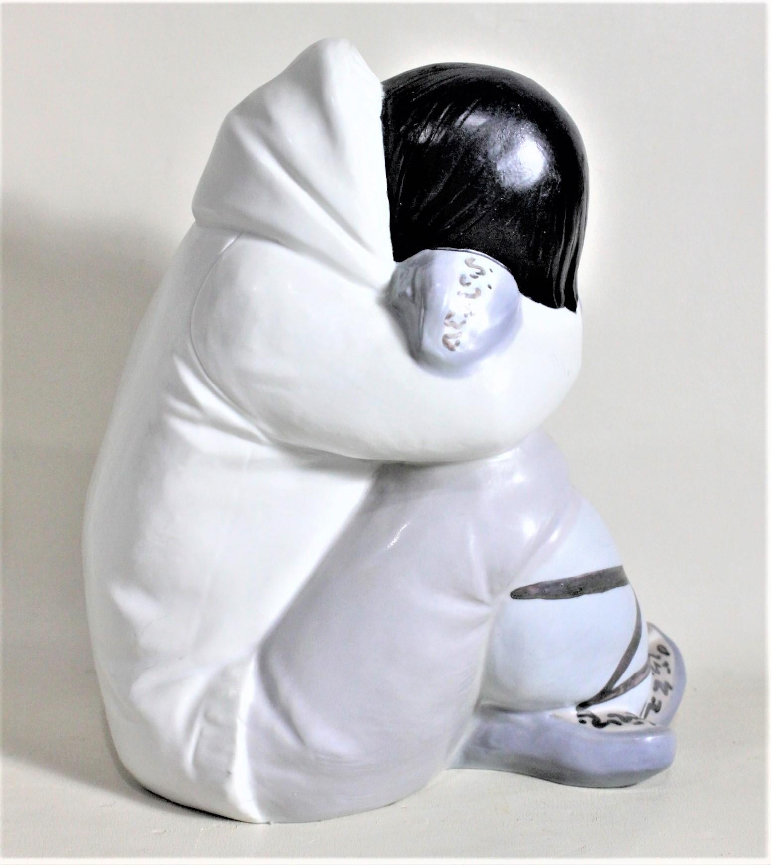 Native American Large Lladro Yupik or Inuit Boy Crouched and Resting Figurine or Sculpture For Sale