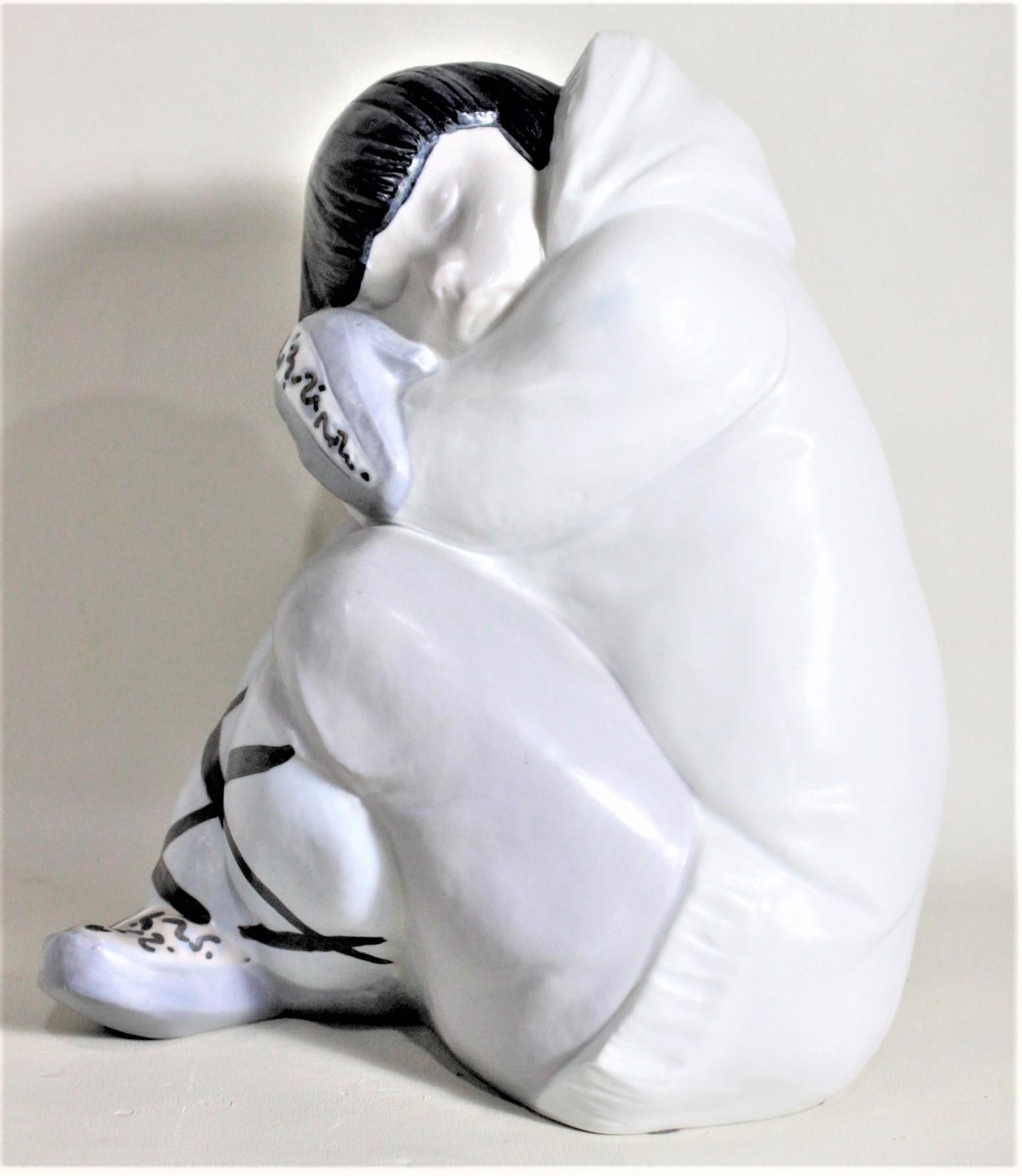 Hand-Painted Large Lladro Yupik or Inuit Boy Crouched and Resting Figurine or Sculpture For Sale