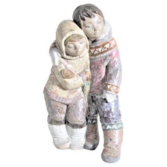 Large Lladro Yupik or Inuit Boy and Girl Affectionately Embracing Figurine