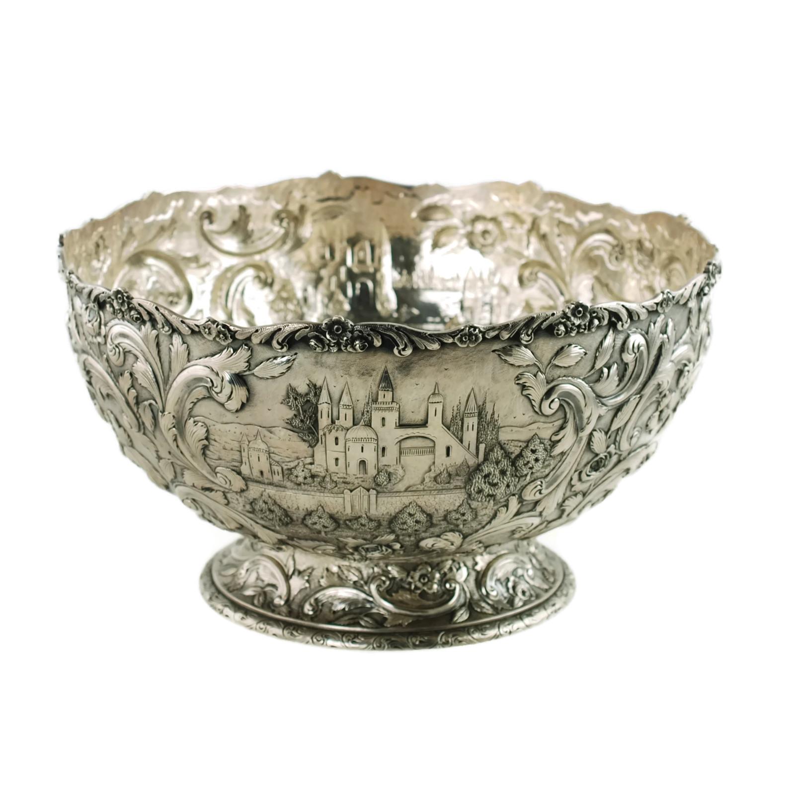 Large loring andrews sterling silver footed punch bowl repoussé castle pattern for sale at 1stdibs