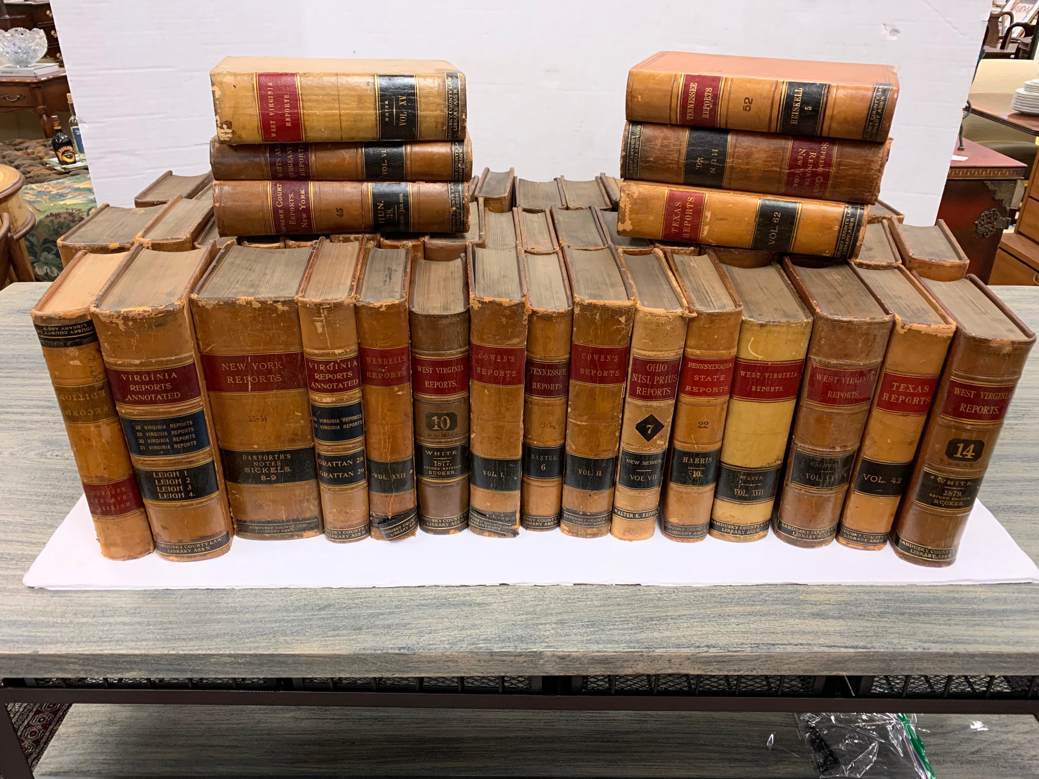 Set of fifty-four antique leather bound legal books by Sandusky County Law Library Association.
These books can be used for decorative purposes and the like. They have a lot of age and patina to the leather. Some of the bindings are loose and there