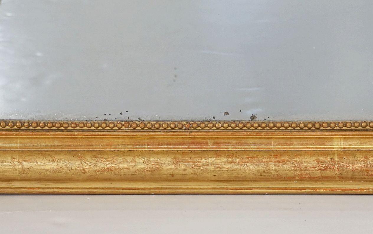 Grand miroir habillé ou console doré Louis Philippe (H 68 x L 32 1/4) Bon état - En vente à Austin, TX