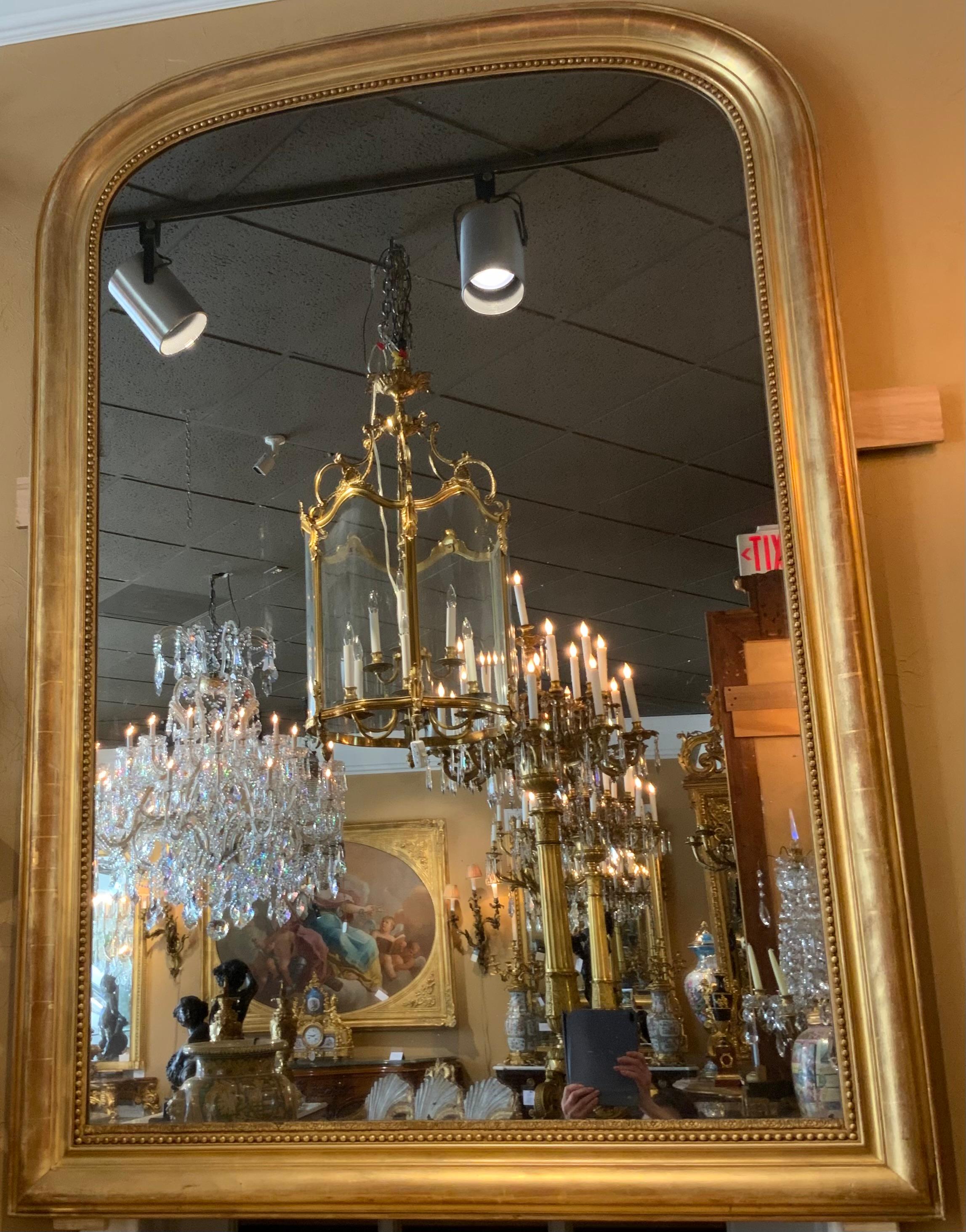 Gran espejo de madera dorada de época Louis Philippe siglo XIX en venta