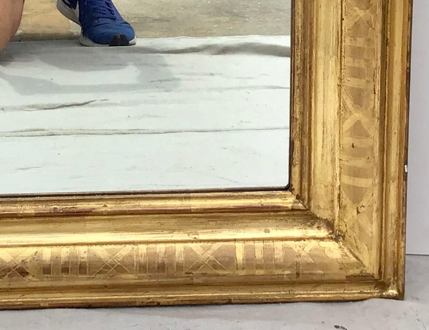 Giltwood Large Louis Phillippe Carved and Gilt Mirror