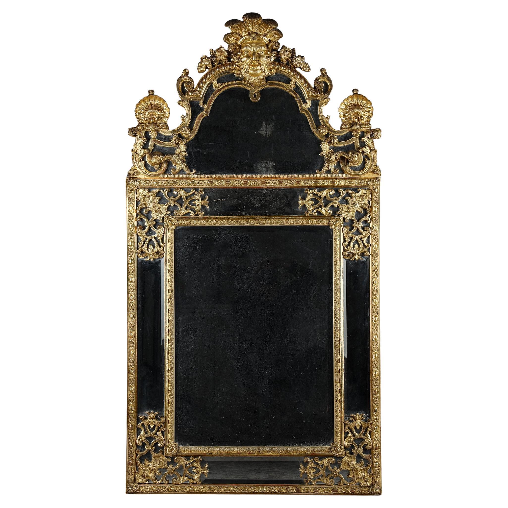 Large Louis XIV mirror decorated with shells, foliage and masks