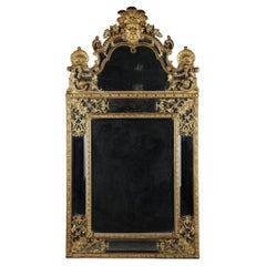 Large Louis XIV mirror decorated with shells, foliage and masks