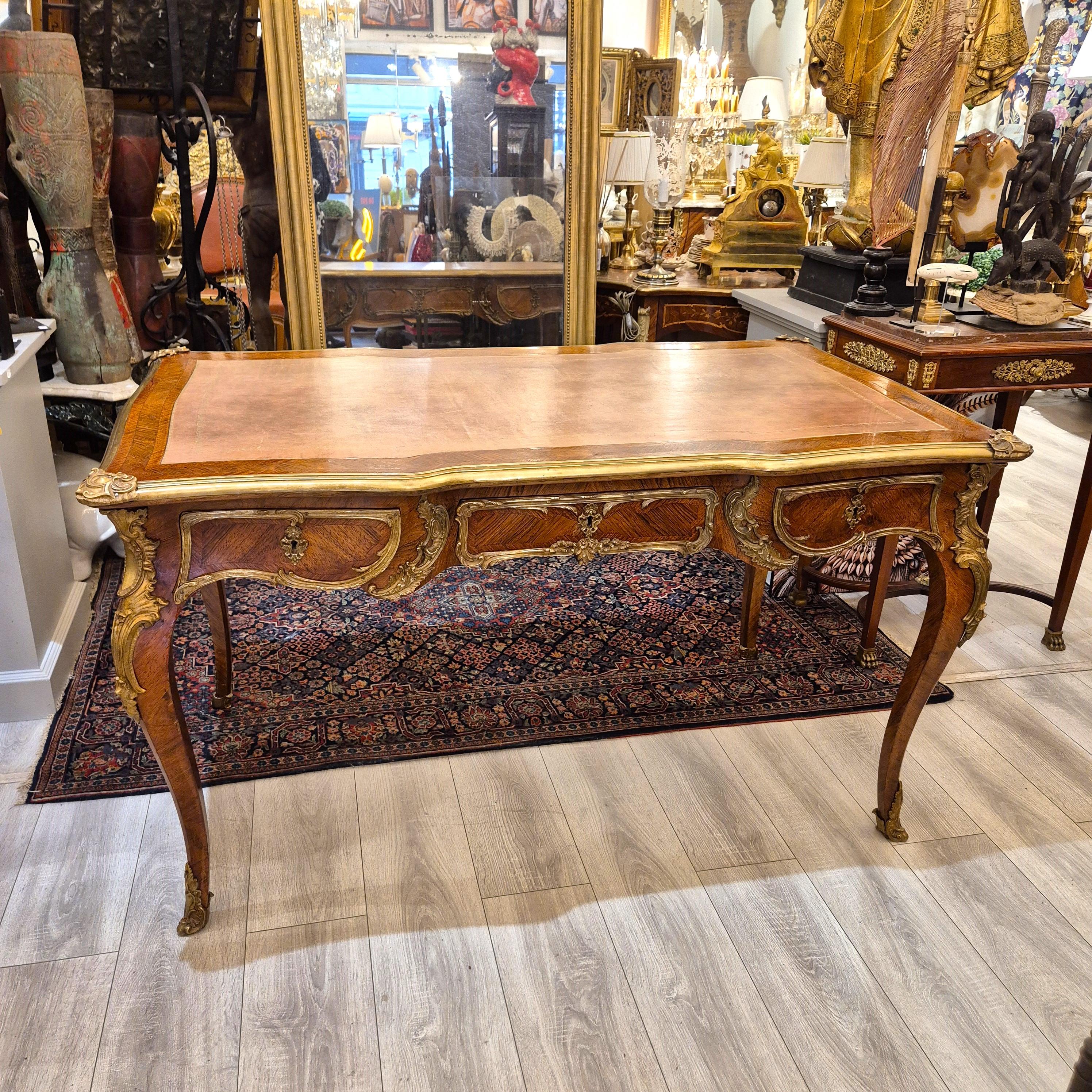Gilt Large Louis XV style flat desk, marquetry and gilt bronze, 19th century work For Sale