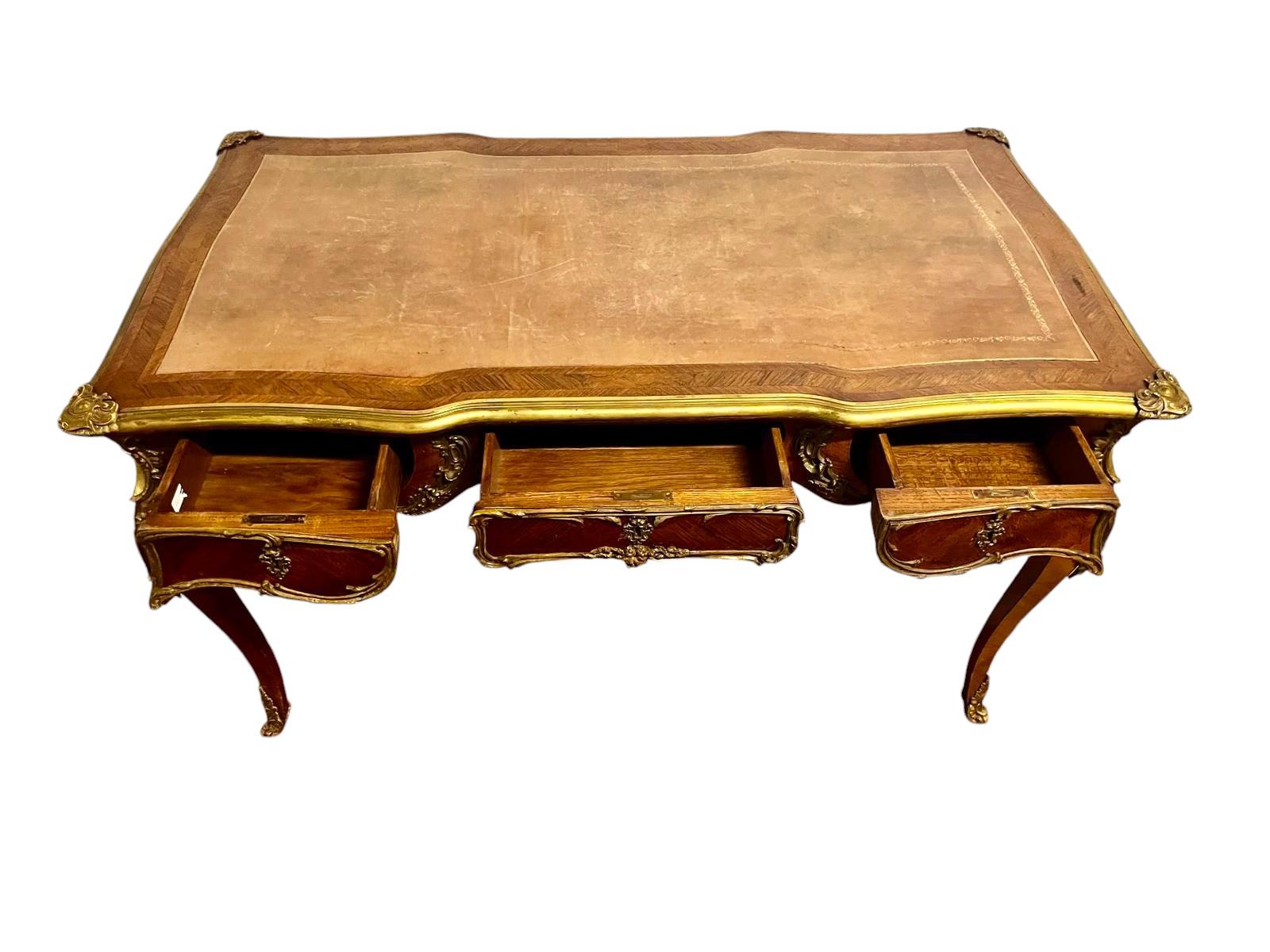 Mid-19th Century Large Louis XV style flat desk, marquetry and gilt bronze, 19th century work For Sale