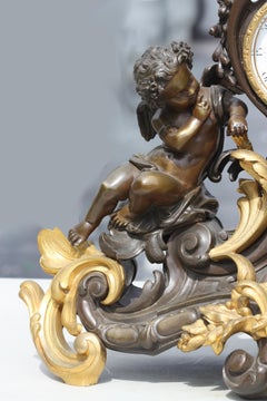 Large Louis XV Style Gilt and Patinated Bronze Mantel Clock