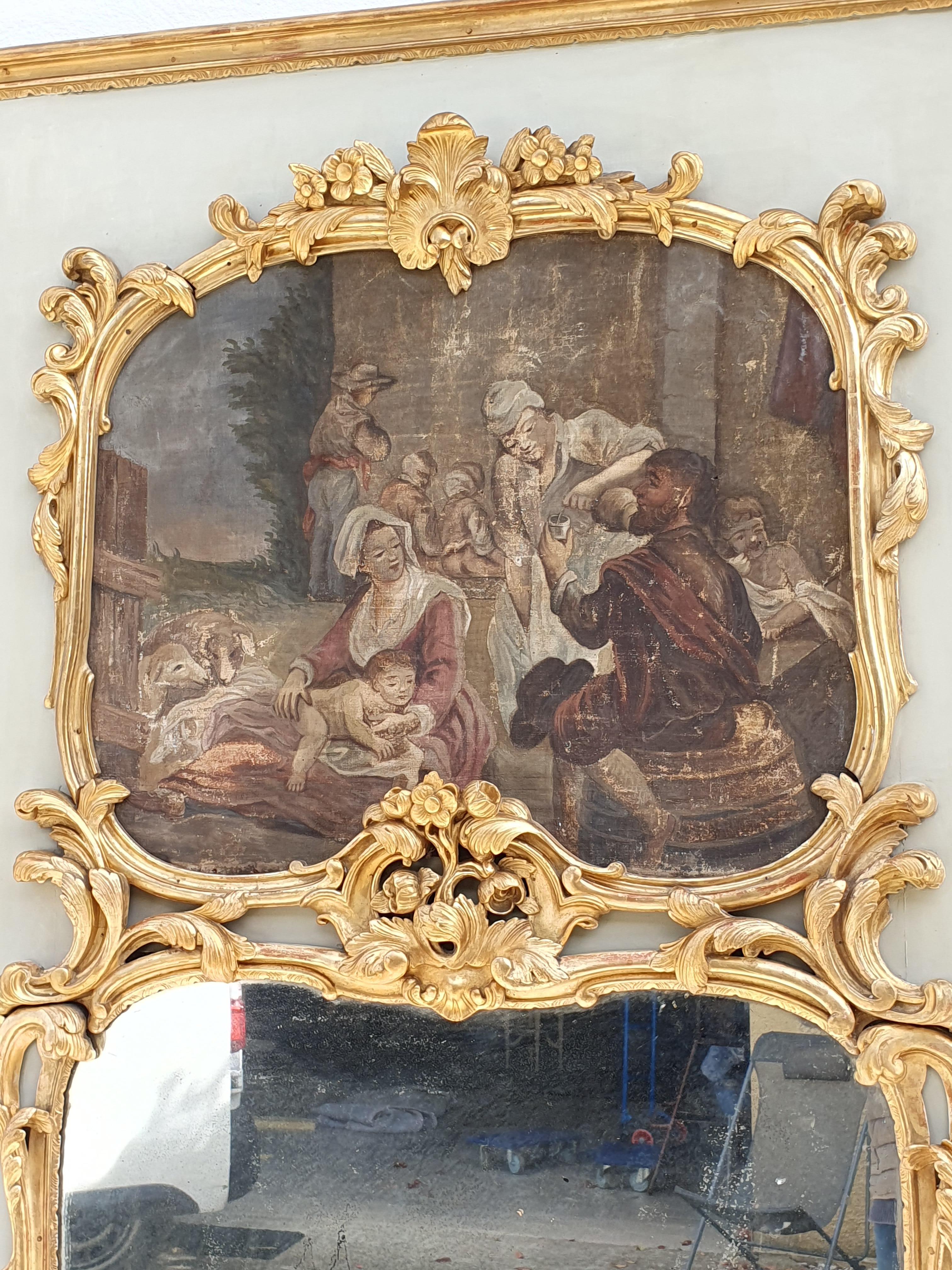 Bois Grand Trumeau Louis XV en bois laqué et doré en vente