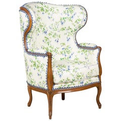 Large Louis XV Upholstered Walnut Wing Bergère with Cabriole Legs