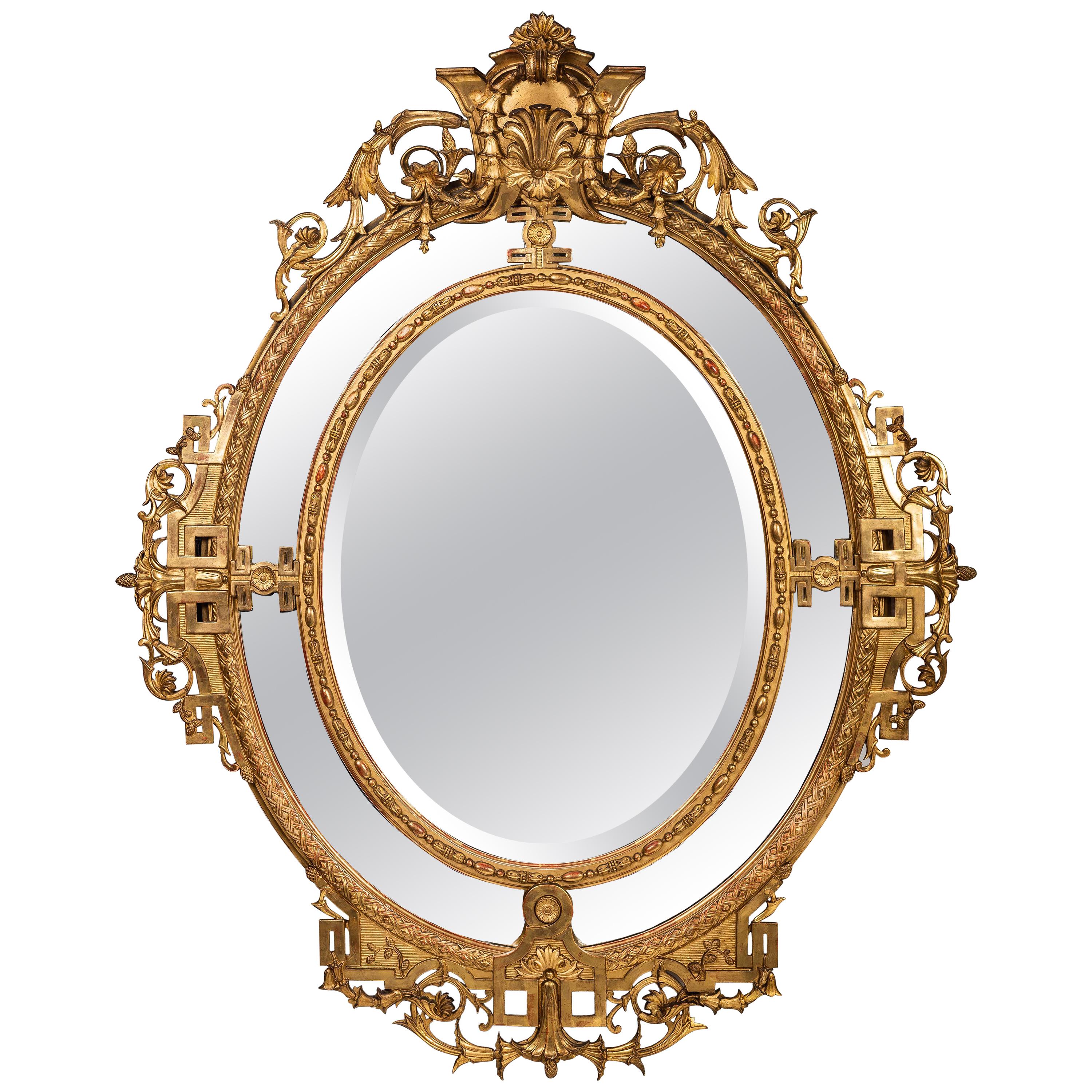 Grand miroir de style Louis XVI encadré à double cadre en bois doré, France, 19ème siècle