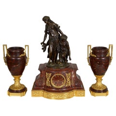 Large Louis XVI style gilded clock set, C19th
