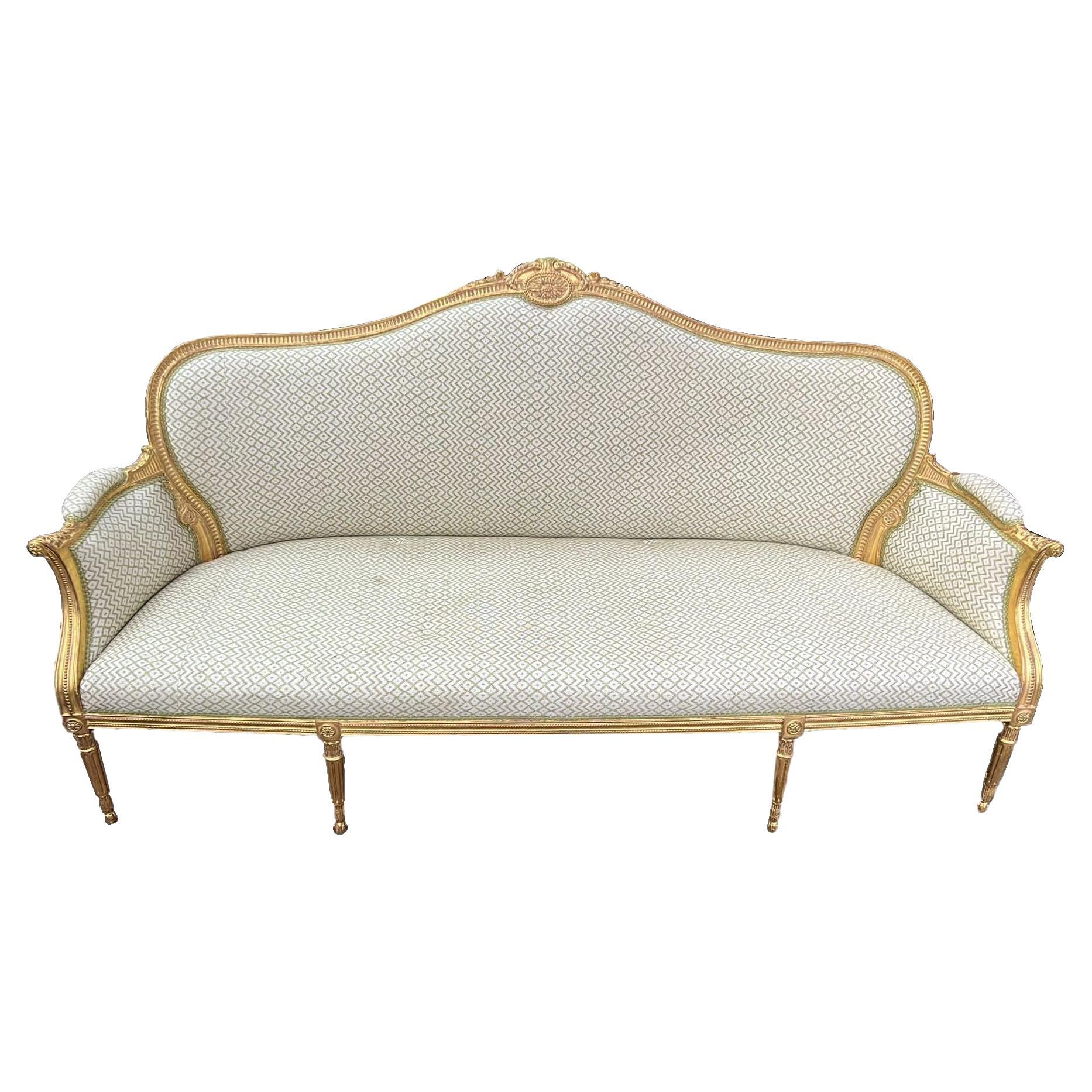 Large Louis XVI style gilt wood sofa, circa 1900 For Sale