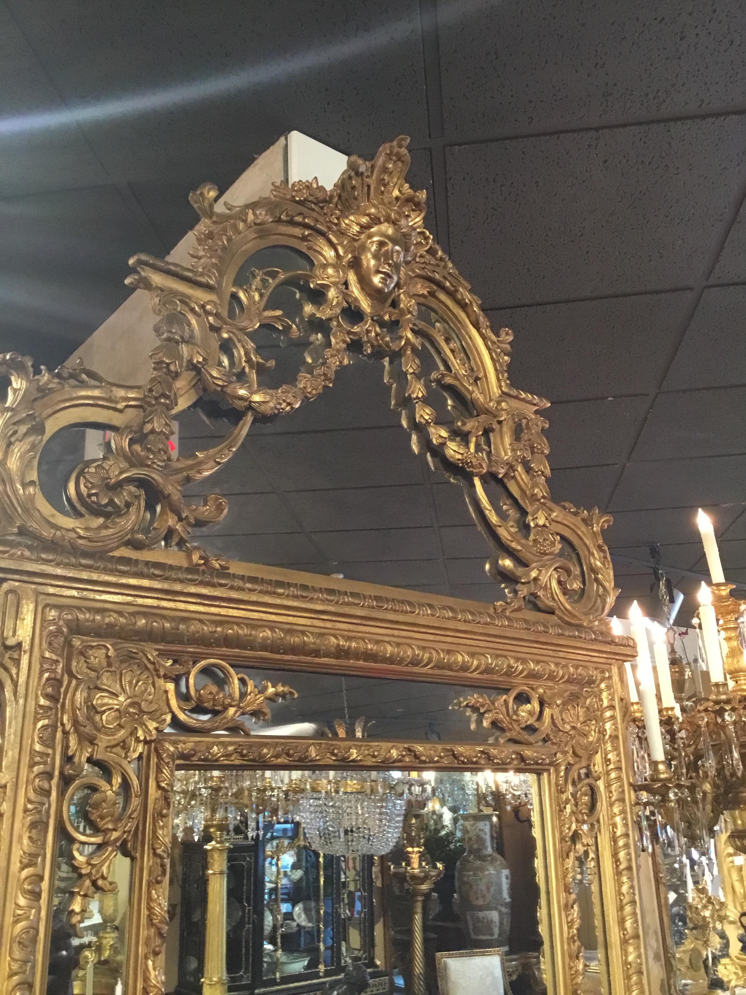 Large Louis XVI-Style Giltwood mirror With mask of Minerva, 19 th c. For Sale 2