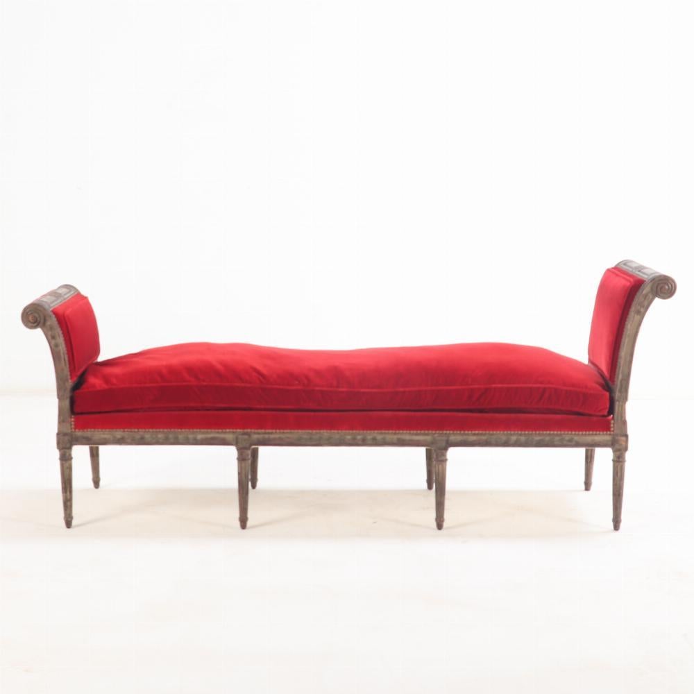 Carved Large Louis XVI style upholstered walnut window bench, C 1900.